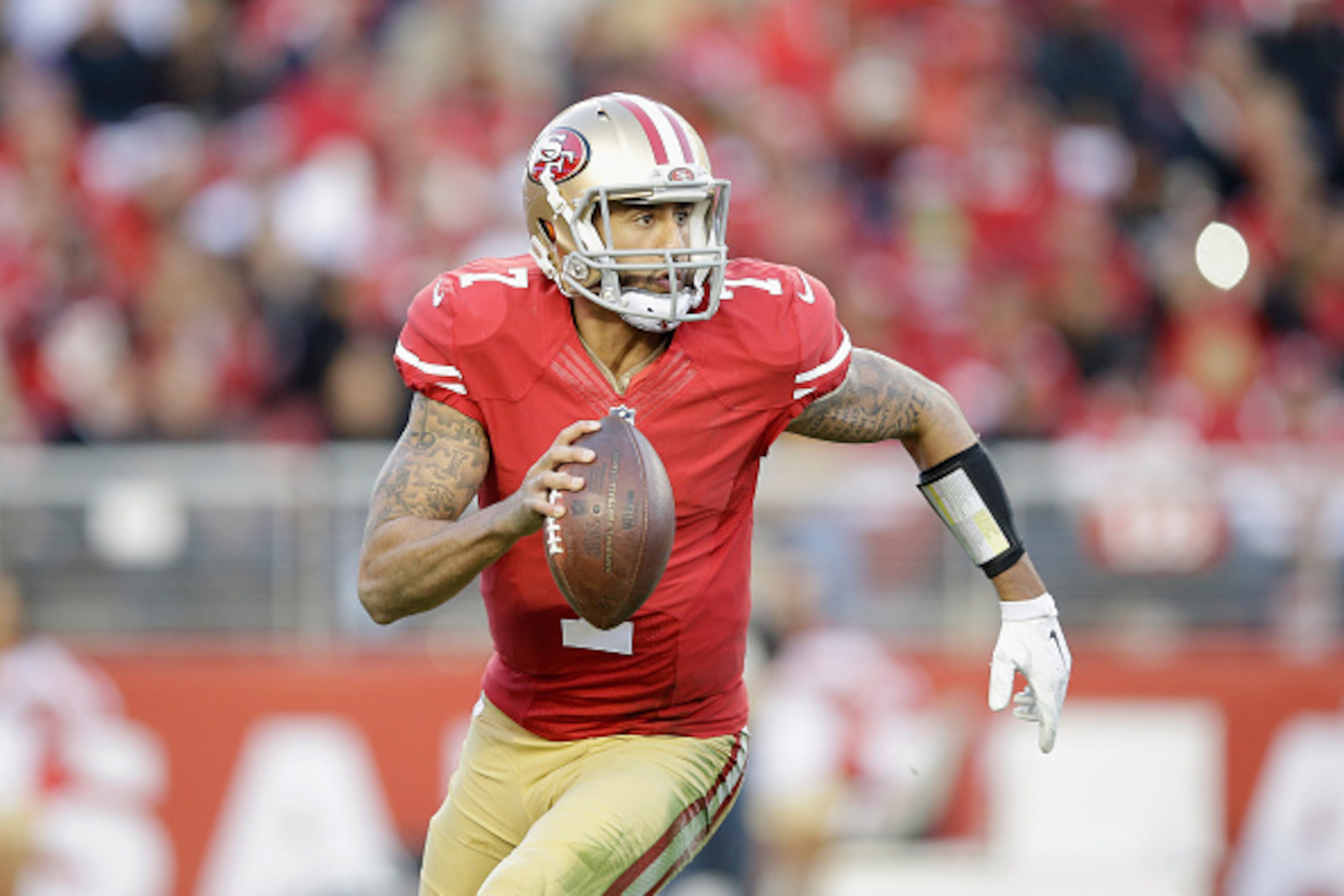 SANTA CLARA, CA - DECEMBER 28:  Colin Kaepernick #7 of the San Francisco 49ers in action against the Arizona Cardinals at Levi's Stadium on December 28, 2014 in Santa Clara, California.  (Photo by Ezra Shaw/Getty Images)