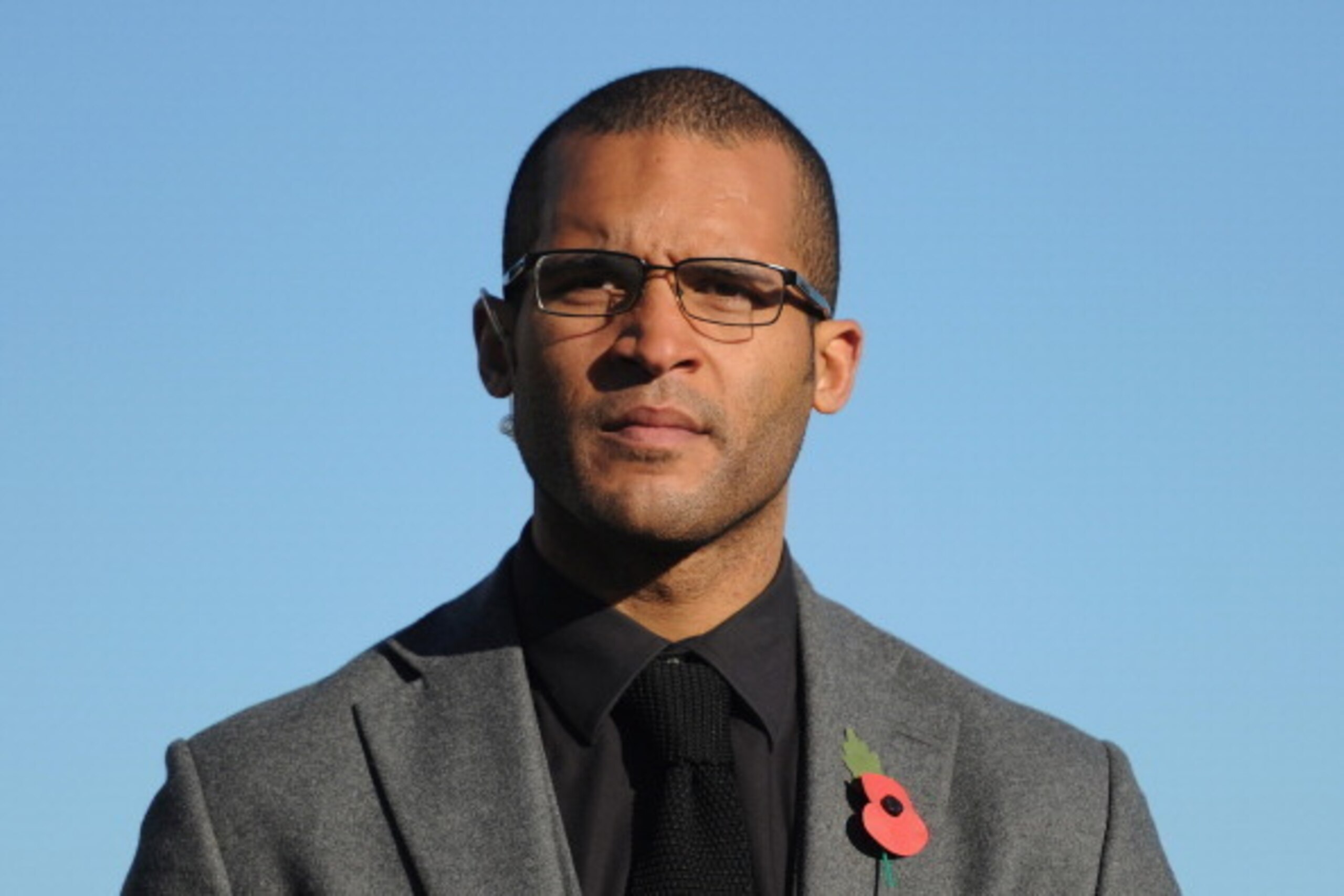 BISHOP'S STORTFORD, ENGLAND - NOVEMBER 10:  Former Northampton Town player Clarke Carlisle before the FA Cup First Round match between Bishop's Storford and Northampton Town ProKit UK stadium on November 10, 2013 in Bishop's Stortford, England.  (Photo by