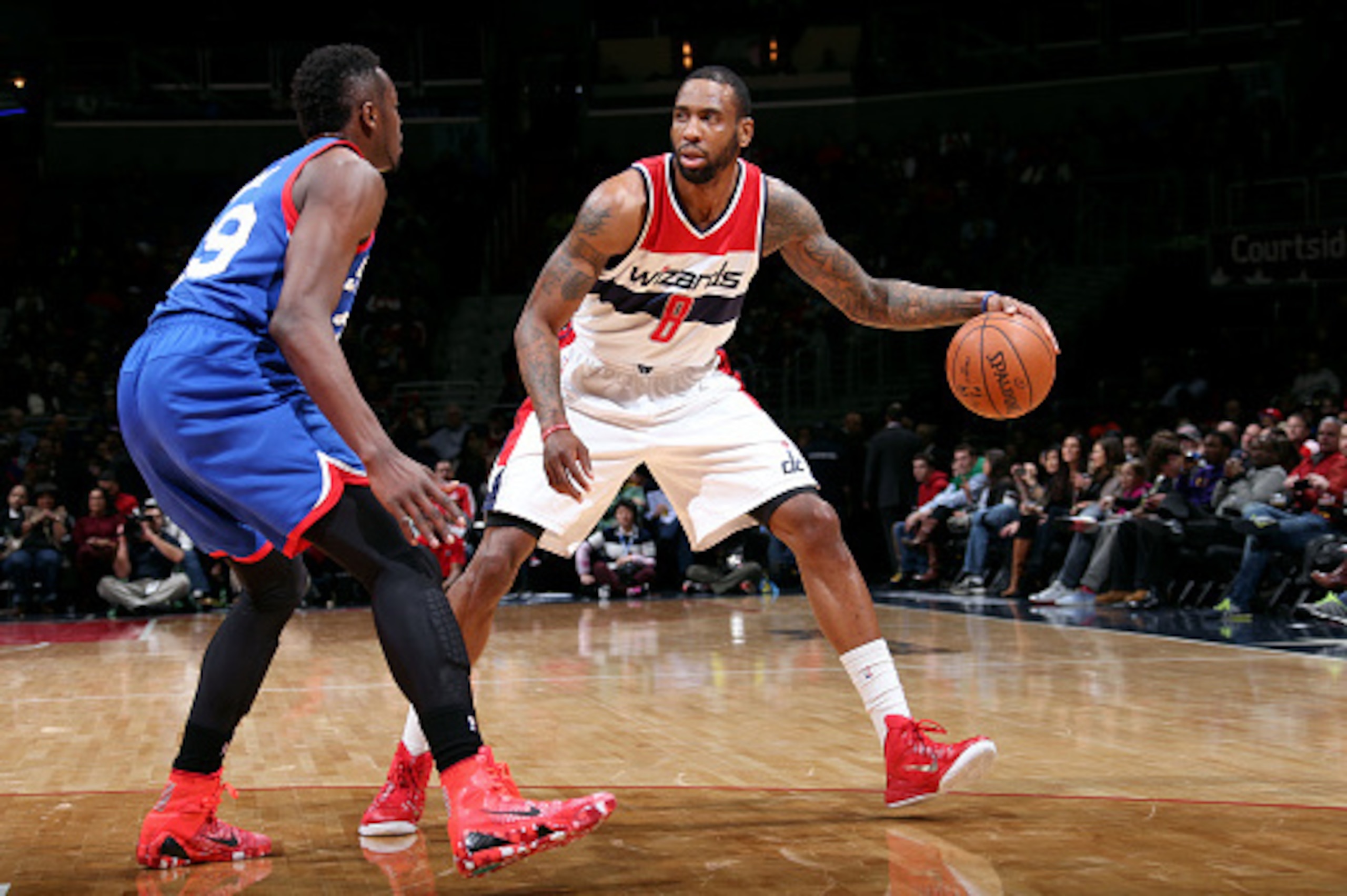 WASHINGTON, DC -  JANUARY 19: Rasual Butler #8 of the Washington Wizards handles the ball against the Philadelphia 76ers on January 19, 2015 at Verizon Center in Washington, DC. NOTE TO USER: User expressly acknowledges and agrees that, by downloading and