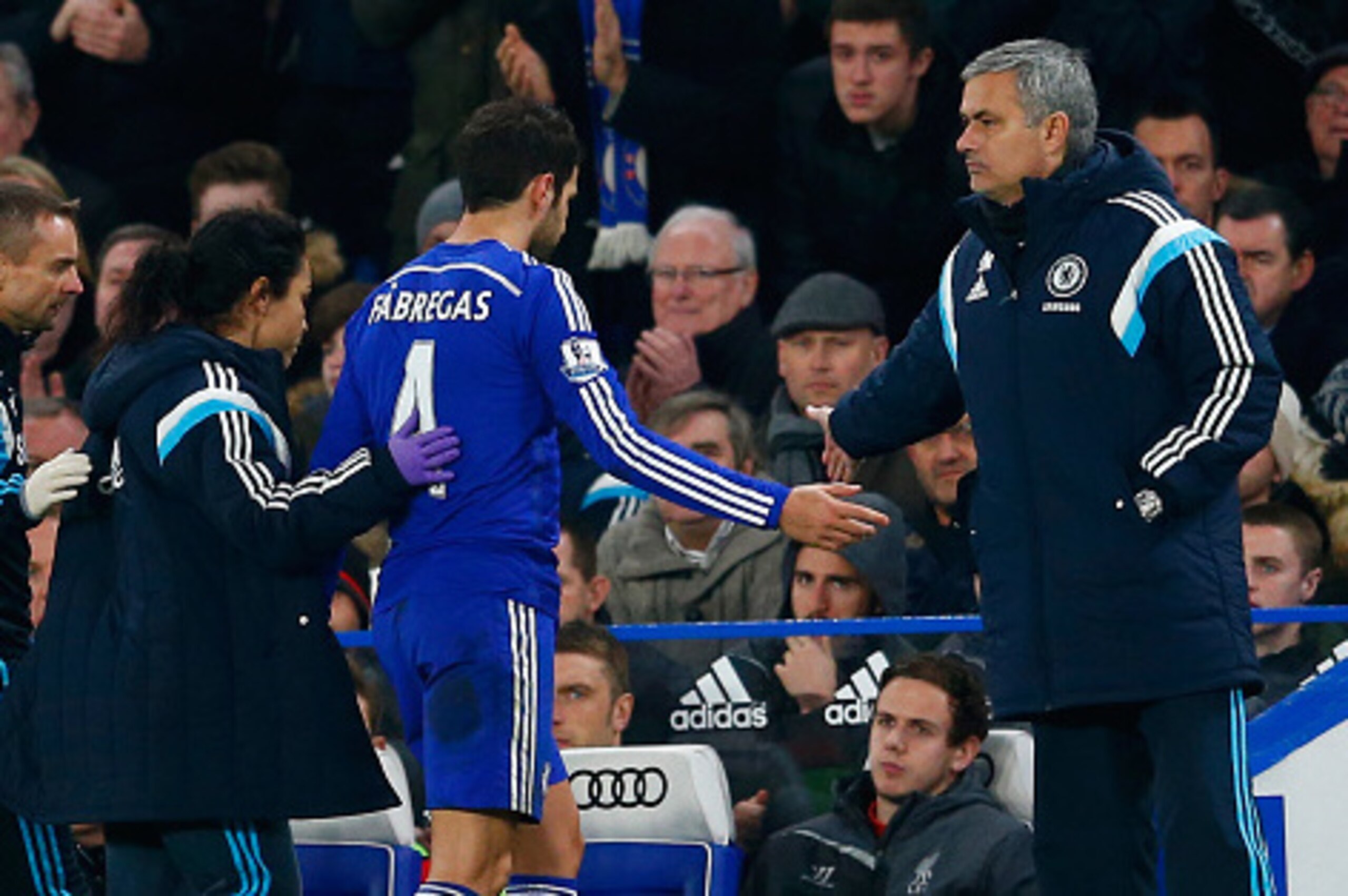 LONDON, ENGLAND - JANUARY 27: Cesc Fabregas of Chelsea high fives Jose Mourinho manager of Chelsea as he is replaced during the Capital One Cup Semi-Final second leg between Chelsea and Liverpool at Stamford Bridge on January 27, 2015 in London, England. LONDON, ENGLAND - JANUARY 27: Cesc Fabregas of Chelsea high fives Jose Mourinho manager of Chelsea as he is replaced during the Capital One Cup Semi-Final second leg between Chelsea and Liverpool at Stamford Bridge on January 27, 2015 in London, England.
