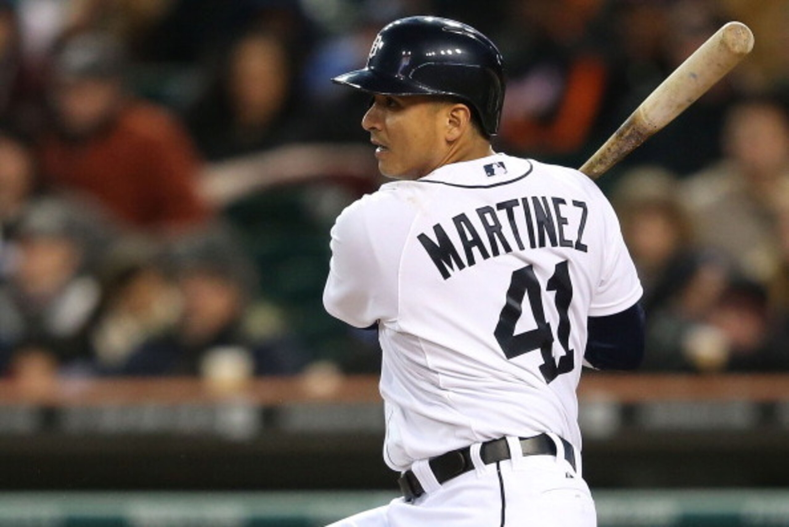 DETROIT, MI - APRIL 24:  Victor Martinez #41 of the Detroit Tigers singles to left center right field scoring teammate Torii Hunter #48 in the fourth inning of the game against the Kansas City Royals at Comerica Park on April 24, 2013 in Detroit, Michigan