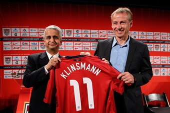 NEW YORK, NY - AUGUST 01:  U.S. Soccer President (L) Sunil Gulati officially announces (R) Jurgen Klinsmann as the new head coach of the U.S. Men’s National Team during a press conference at NikeTown on August 1, 2011 in New York City.  (Photo by Chris Tr
