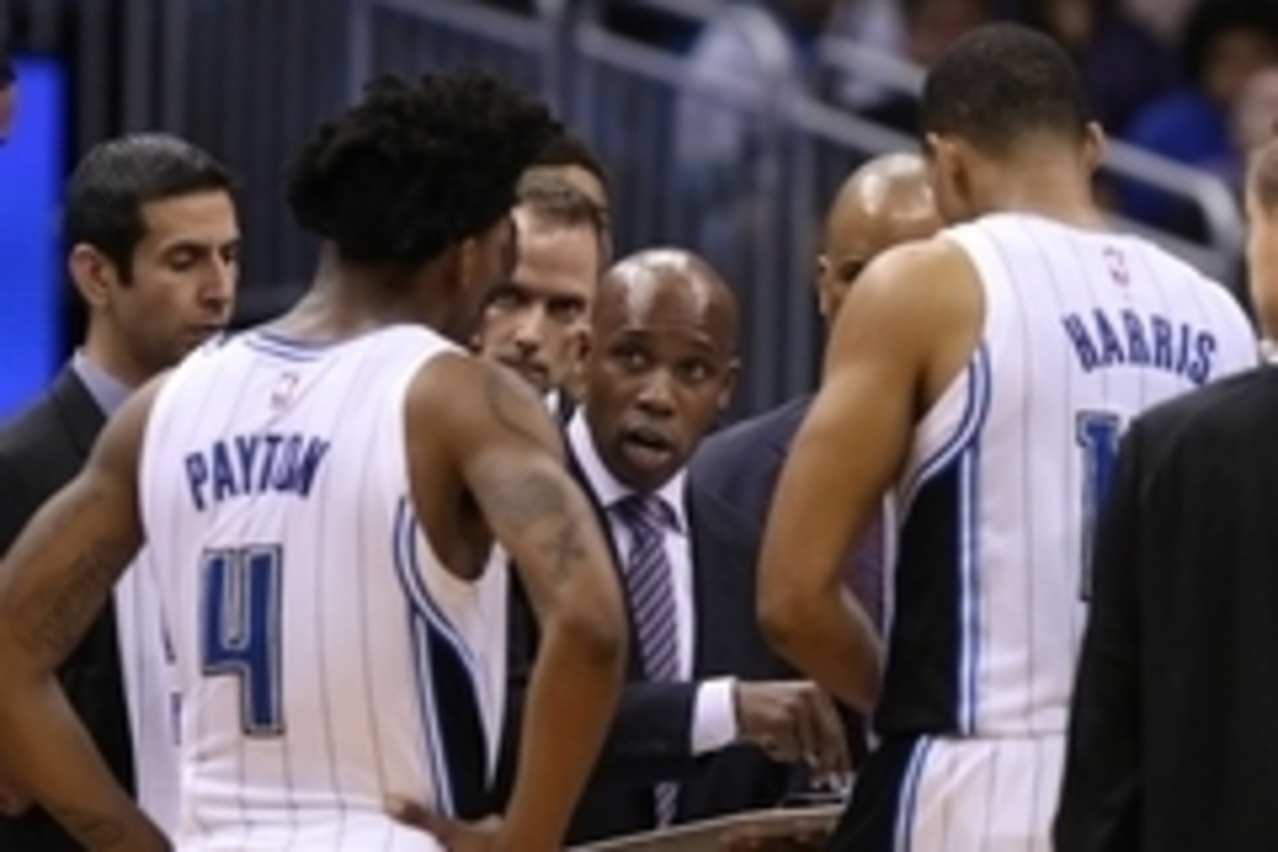 Dec 10, 2014; Orlando, FL, USA; Orlando Magic head coach Jacque Vaughn huddles up with guard Elfrid Payton (4) and forward Tobias Harris (12) against the Washington Wizards during the second half at Amway Center. Washington Wizards defeated the Orlando Ma Dec 10, 2014; Orlando, FL, USA; Orlando Magic head coach Jacque Vaughn huddles up with guard Elfrid Payton (4) and forward Tobias Harris (12) against the Washington Wizards during the second half at Amway Center. Washington Wizards defeated the Orlando Ma