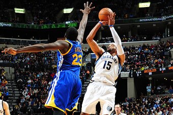 MEMPHIS, TN - DECEMBER 16: Vince Carter #15 of the Memphis Grizzlies puts up a shot against the Golden State Warriors on December 16, 2014 at the FedEx Forum in Memphis, Tennessee.  NOTE TO USER: User expressly acknowledges and agrees that, by downloading