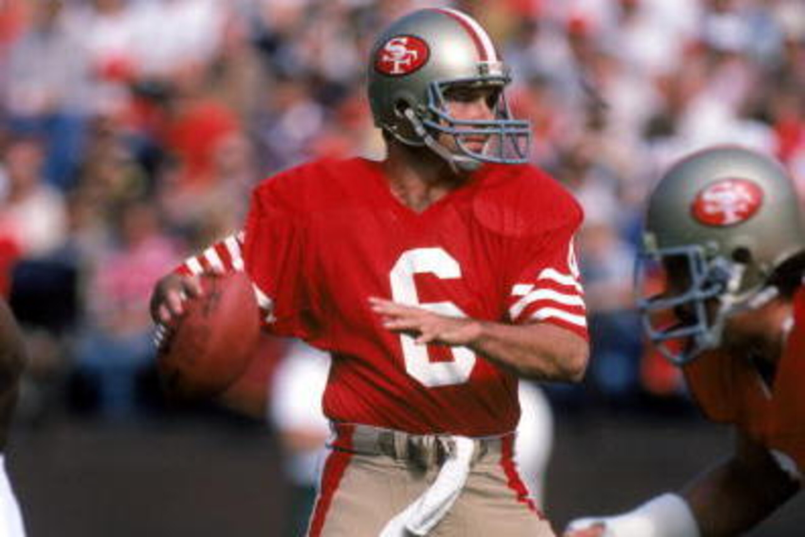 SAN FRANCISCO - NOVEMBER 3:  Quarterback Matt Cavanaugh #6 of the San Francisco 49ers looks to pass during a game against the Philadelphia Eagles at Candlestick Park on November 3, 1985 in San Francisco, California.  The 49ers won 51-7.  (Photo by George 