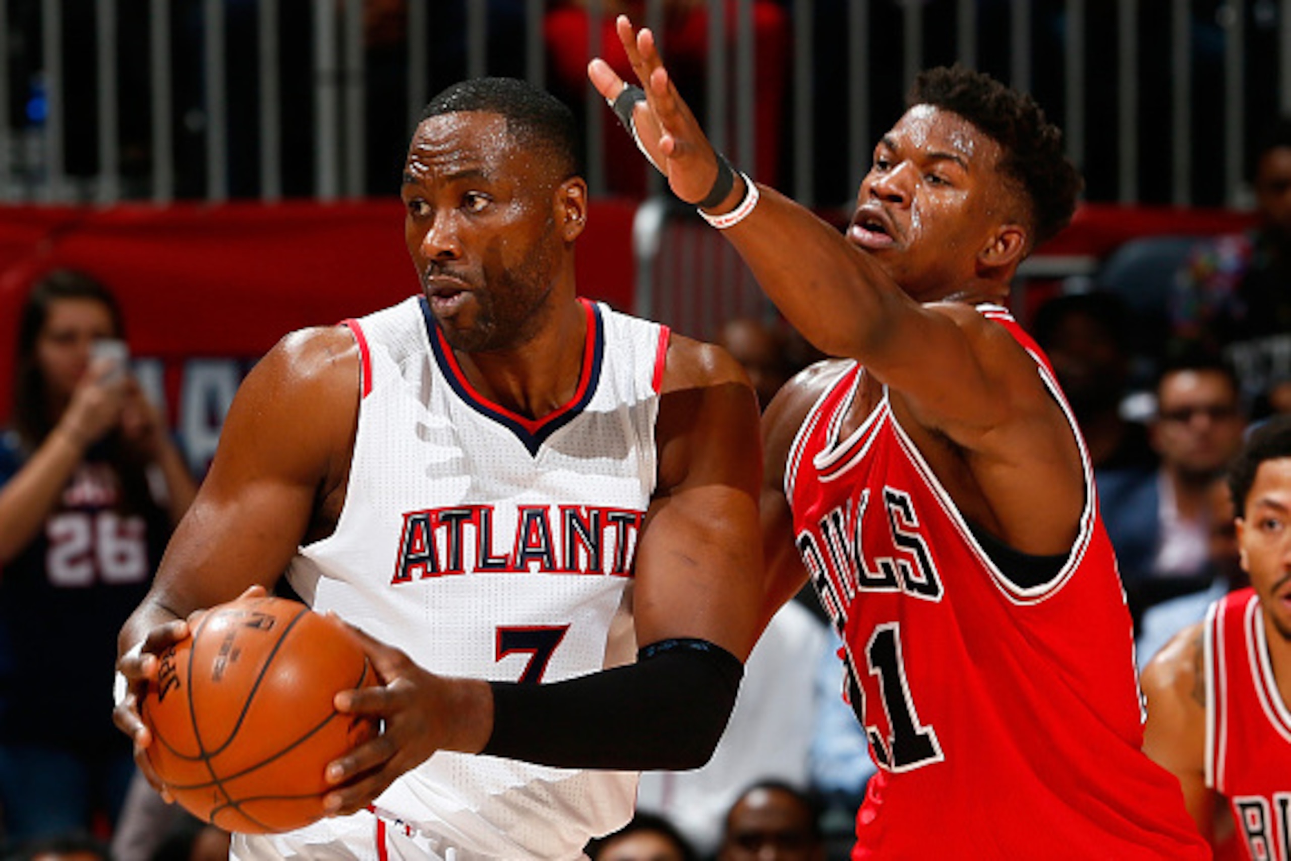ATLANTA, GA - DECEMBER 15:  Jimmy Butler #21 of the Chicago Bulls against Elton Brand #7 of the Atlanta Hawks at Philips Arena on December 15, 2014 in Atlanta, Georgia.  NOTE TO USER: User expressly acknowledges and agrees that, by downloading and or usin