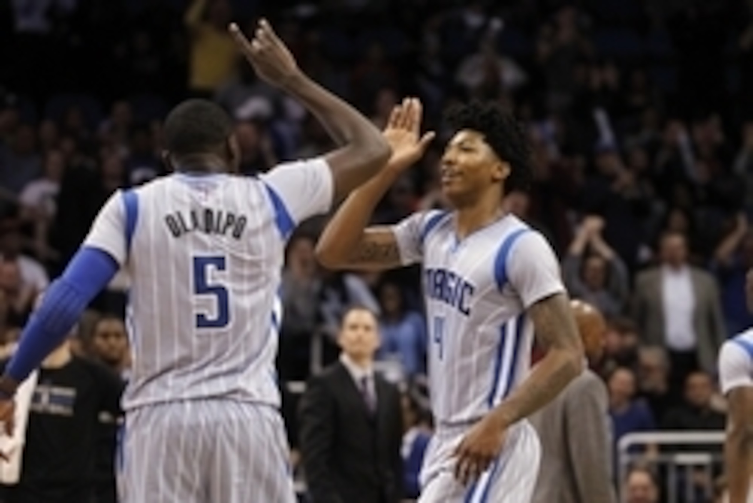 Jan 14, 2015; Orlando, FL, USA; Orlando Magic guard Victor Oladipo (5) and guard Elfrid Payton (4) high five after Oladipo dunked against the Houston Rockets during the second half  at Amway Center. Orlando Magic defeated the Houston Rockets 120-113. Mand