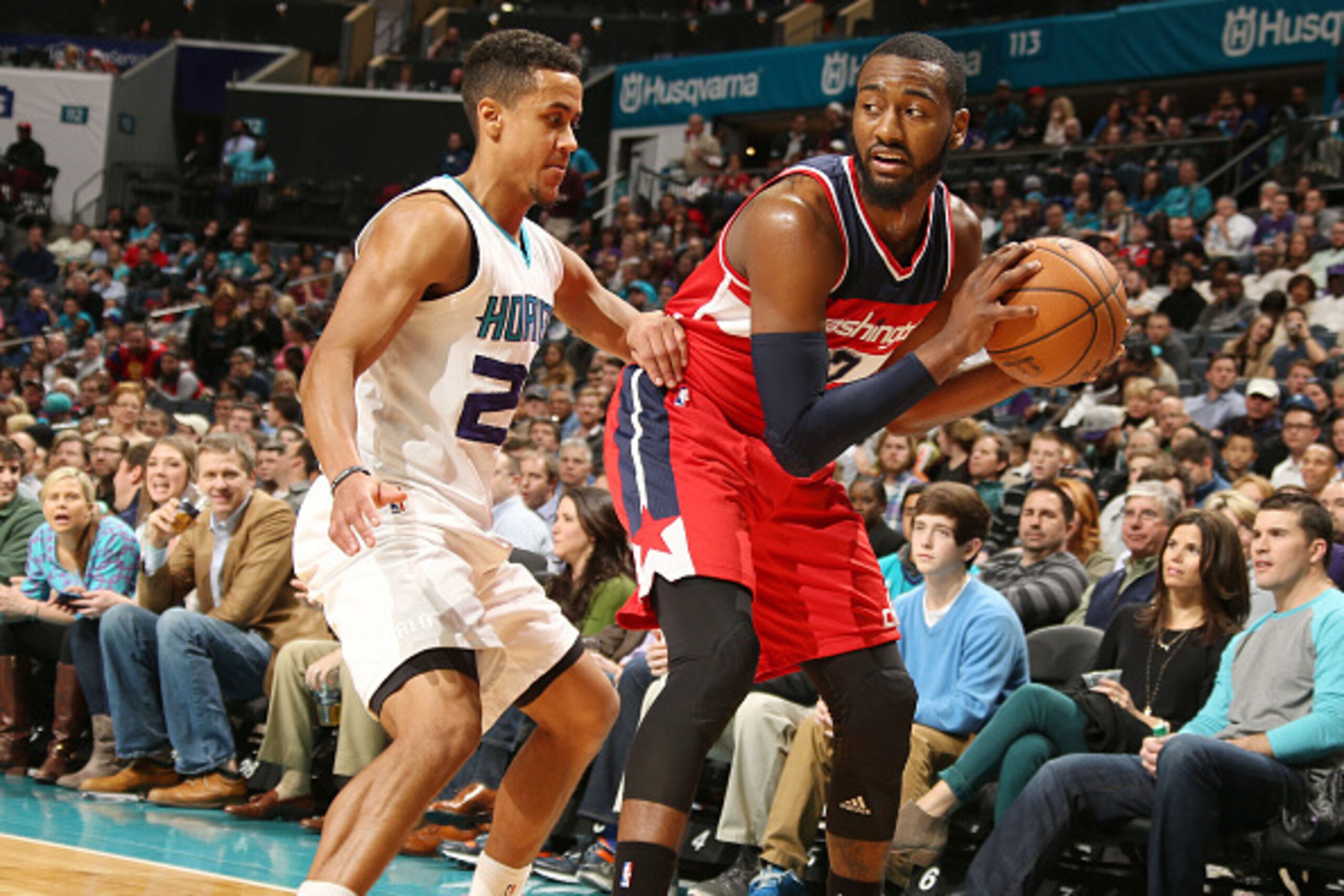 CHARLOTTE, NC - FEBRUARY 5: John Wall #2 of the Washington Wizards drives against Brian Roberts #22 of the Charlotte Hornets during the game at the Time Warner Cable Arena on February 5, 2015 in Charlotte, North Carolina. NOTE TO USER: User expressly ack CHARLOTTE, NC - FEBRUARY 5: John Wall #2 of the Washington Wizards drives against Brian Roberts #22 of the Charlotte Hornets during the game at the Time Warner Cable Arena on February 5, 2015 in Charlotte, North Carolina. NOTE TO USER: User expressly ack