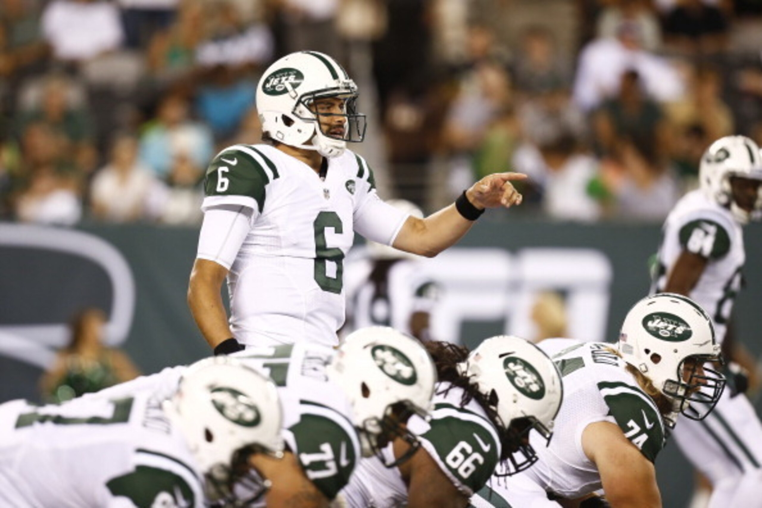 EAST RUTHERFORD, NJ - AUGUST 17:   Mark Sanchez #6 of the New York Jets calls a play against the Jacksonville Jaguars during their preseason game at MetLife Stadium on August 17, 2013 in East Rutherford, New Jersey.  (Photo by Jeff Zelevansky/Getty Images