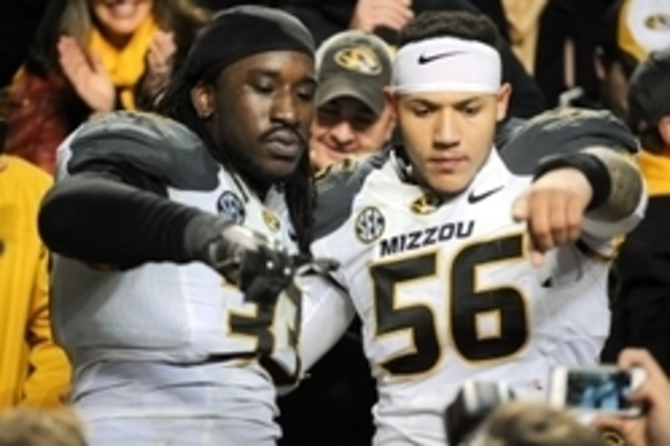 Nov 22, 2014; Knoxville, TN, USA;  Missouri Tigers defensive lineman Markus Golden (33) and defensive lineman Shane Ray (56) celebrate after the game against the Tennessee Volunteers  at Neyland Stadium. Missouri won 29 to 21. Mandatory Credit: Randy Sart