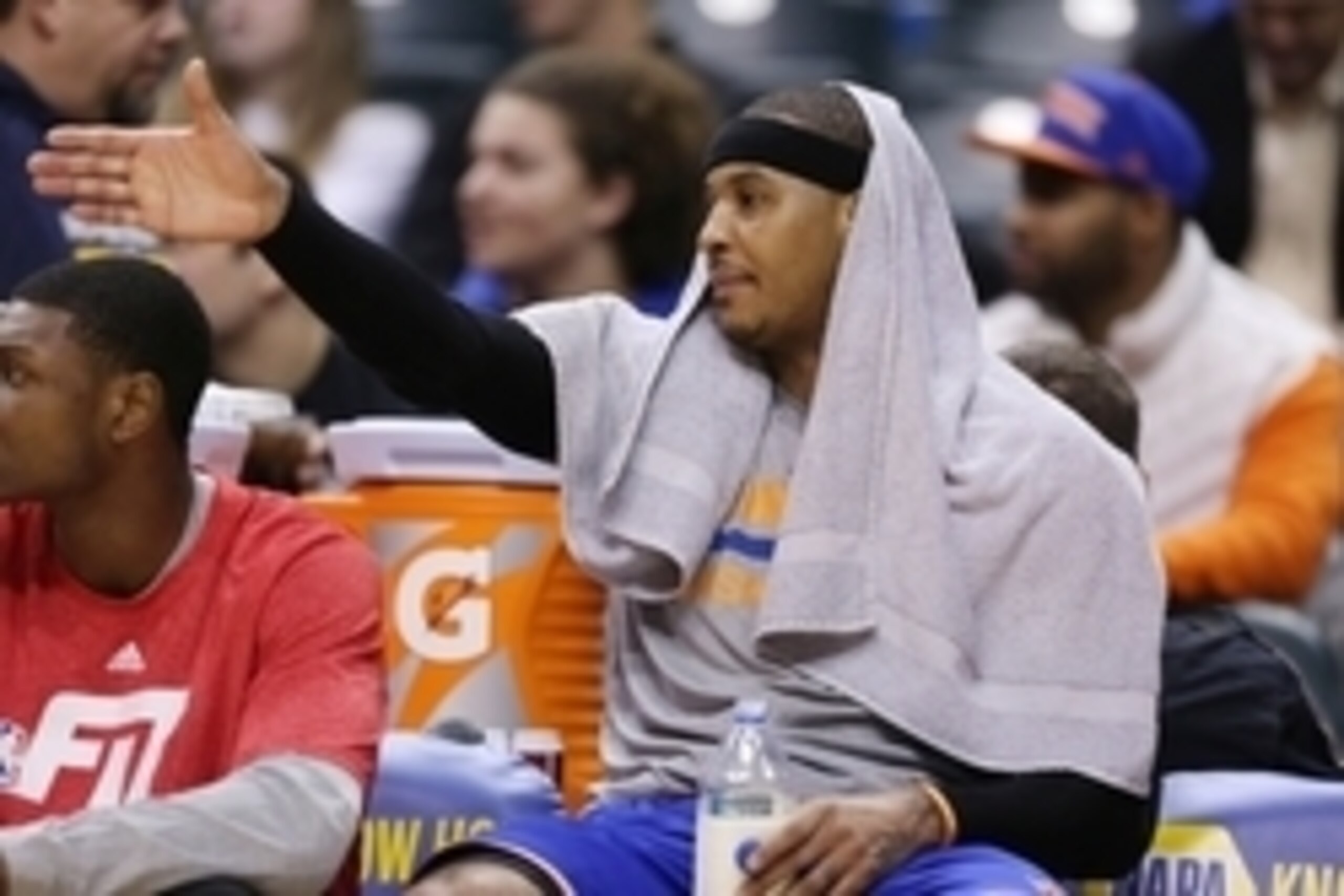 Jan 29, 2015; Indianapolis, IN, USA; New York Knicks forward Carmelo Anthony (7) watches from the bench during a game against the Indiana Pacers at Bankers Life Fieldhouse. Indiana defeats New York 103-82. Mandatory Credit: Brian Spurlock-USA TODAY Sports Jan 29, 2015; Indianapolis, IN, USA; New York Knicks forward Carmelo Anthony (7) watches from the bench during a game against the Indiana Pacers at Bankers Life Fieldhouse. Indiana defeats New York 103-82. Mandatory Credit: Brian Spurlock-USA TODAY Sports