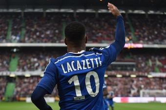 METZ, FRANCE - AUGUST 31:  Alexandre Lacazette of Lyon celebrates scoring his team's first goal during the French Ligue 1 match between FC Metz and Olympique Lyonnais at Stade Saint-Symphorien on August 31, 2014 in Metz, France.  (Photo by Kaz Photography