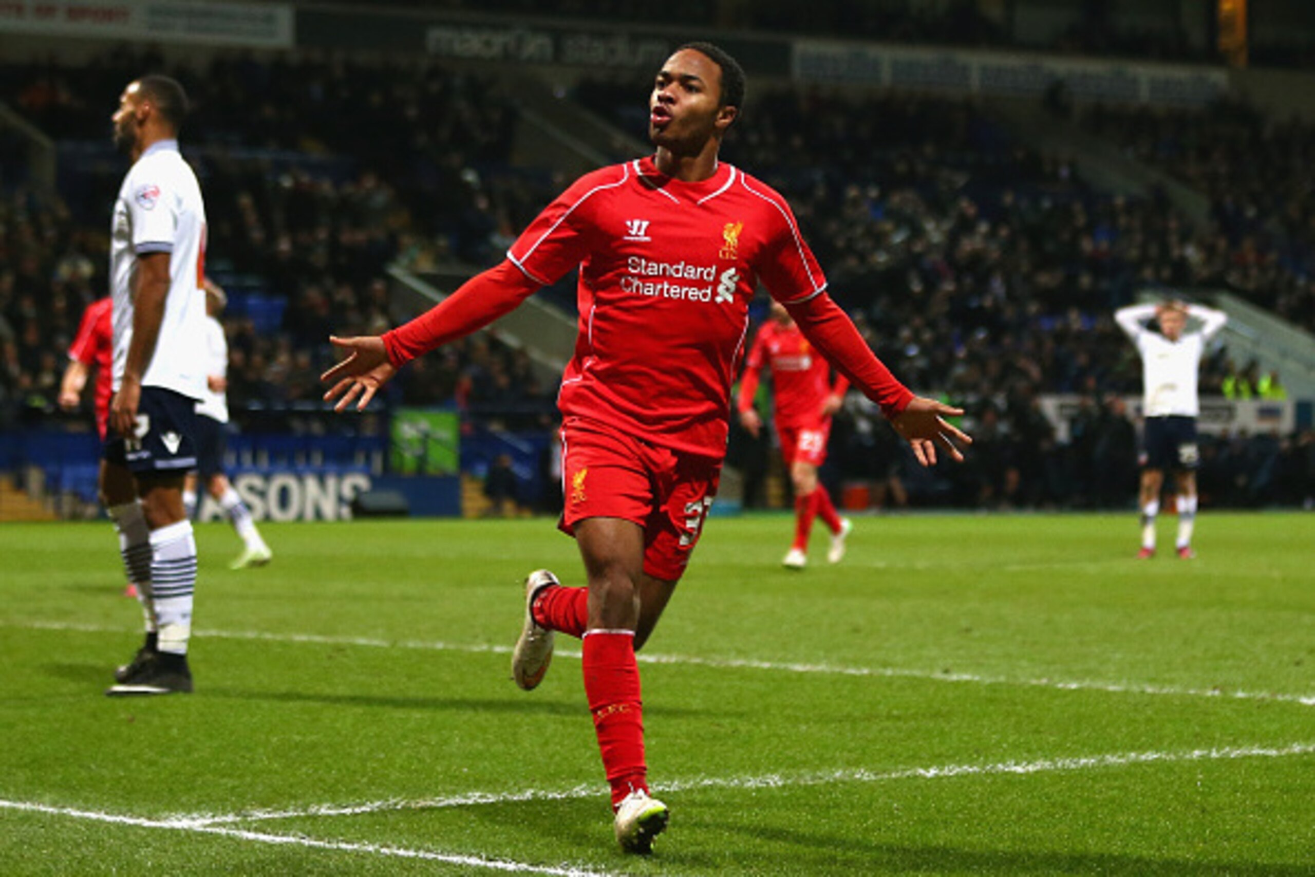 BOLTON, ENGLAND - FEBRUARY 04:  Raheem Sterling of Liverpool celebrates scoring their first goal  during the FA Cup Fourth round replay between Bolton Wanderers and Liverpool at Macron Stadium on February 4, 2015 in Bolton, England.  (Photo by Michael Ste