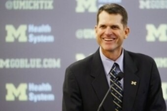 Dec 30, 2014; Ann Arbor, MI, USA; Jim Harbaugh speaks to the media as he is introduced as the new head football coach of the Michigan Wolverines at Jonge Center. Mandatory Credit: Rick Osentoski-USA TODAY Sports