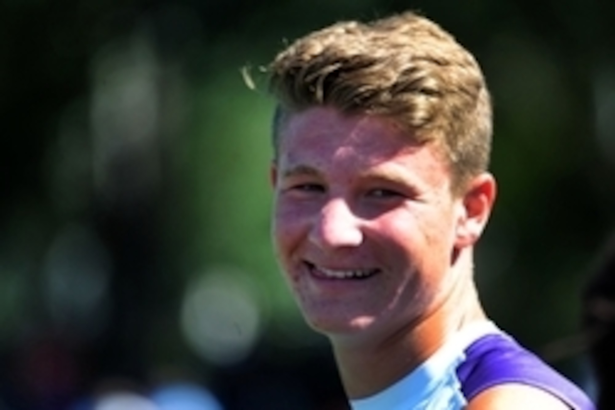 Jul 10, 2014; Beaverton, OR, USA; Apocalypse quarterback Blake Barnett (12) smiles as he waits along the sidelines during Nike Football ' The Opening' at Nike World Headquarters.  Mandatory Credit: Steve Dykes-USA TODAY Sports