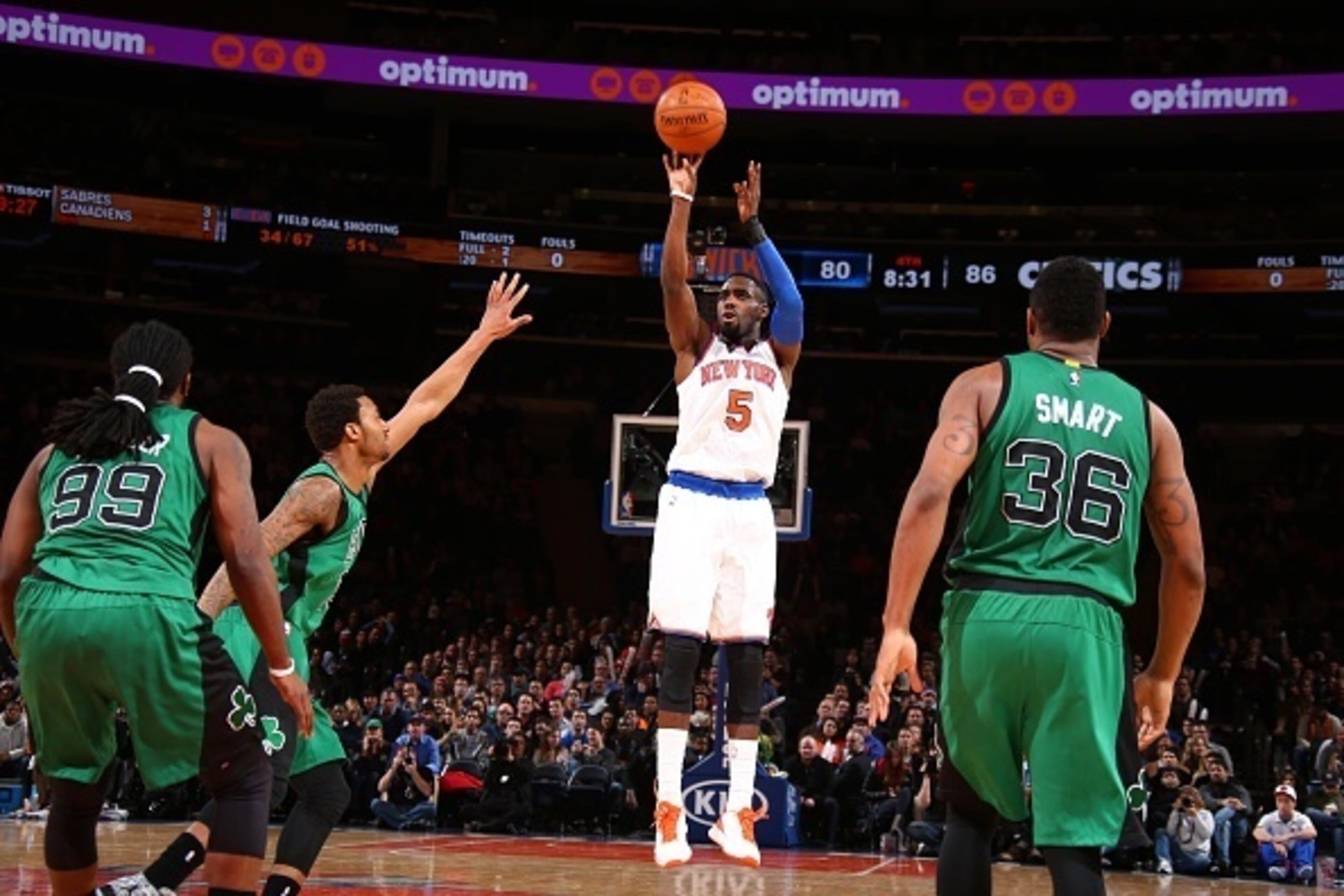 NEW YORK, NY - FEBRUARY 3:  Tim Hardaway Jr. #5 of the New York Knicks shoots against the Boston Celtics on February 3, 2015 at Madison Square Garden in New York City.  NOTE TO USER: User expressly acknowledges and agrees that, by downloading and or using