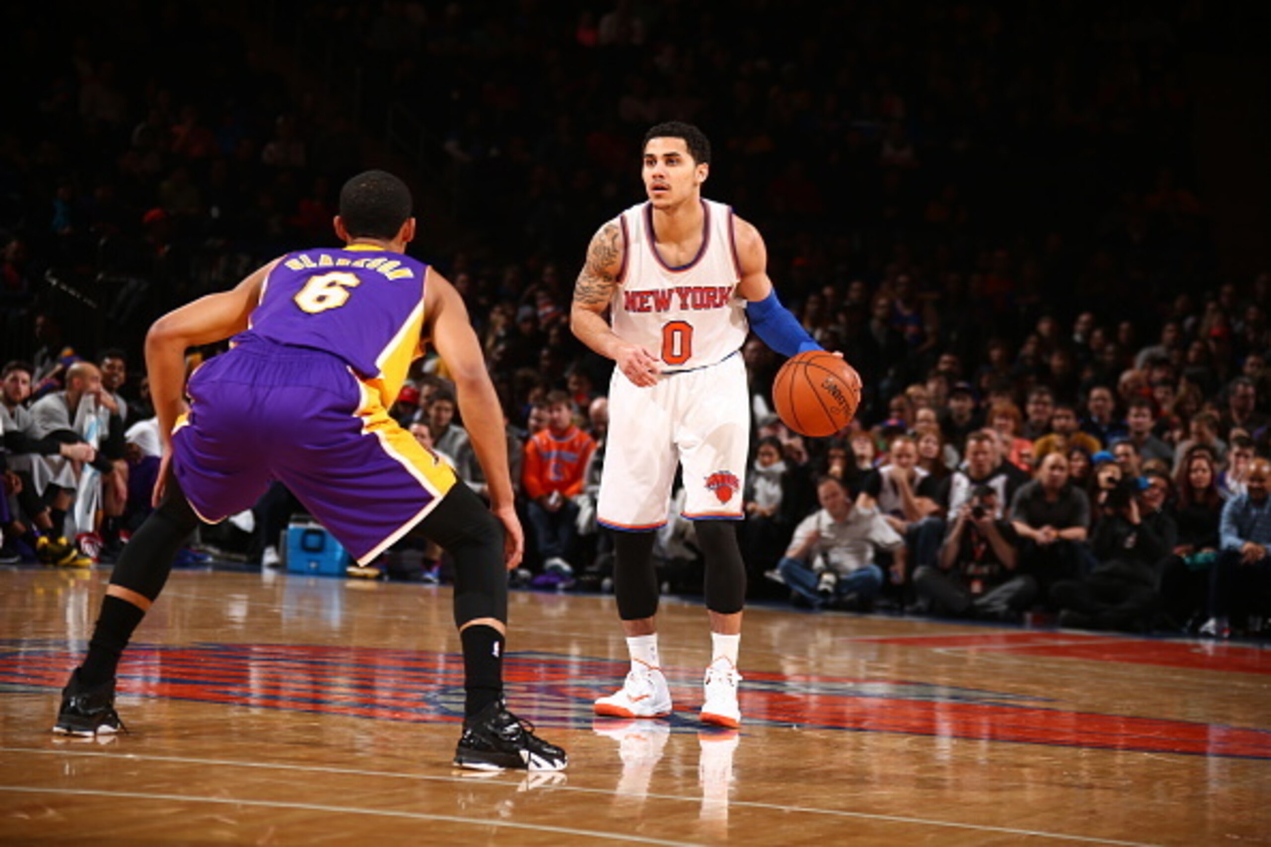 NEW YORK, NY -  FEBRUARY 2: Shane Larkin #0 of the New York Knicks looks to move the ball against Jordan Clarkson #6 of the Los Angeles Lakers during the game on February 2, 2015 at Madison Square Garden in New York, New York . NOTE TO USER: User expressl