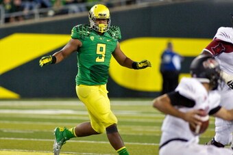 EUGENE, OR - SEPTEMBER 1:  Arik Armstead #9 of the Oregon Ducks runs to the ball against the Arkansas State Red Wolves on September 1, 2012 at Autzen Stadium in Eugene, Oregon. Oregon won the game 57-34.  (Photo by Craig Mitchelldyer/Getty Images)