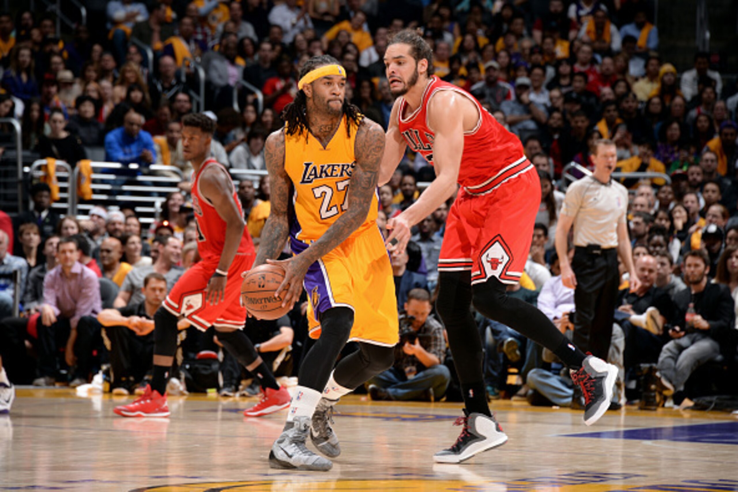 LOS ANGELES, CA - JANUARY 29: Jordan Hill #27 of the Los Angeles Lakers handles the ball against Joakim Noah #13 of the Chicago Bulls at STAPLES Center on January 29, 2015 in Los Angeles, California. NOTE TO USER: User expressly acknowledges and agrees th