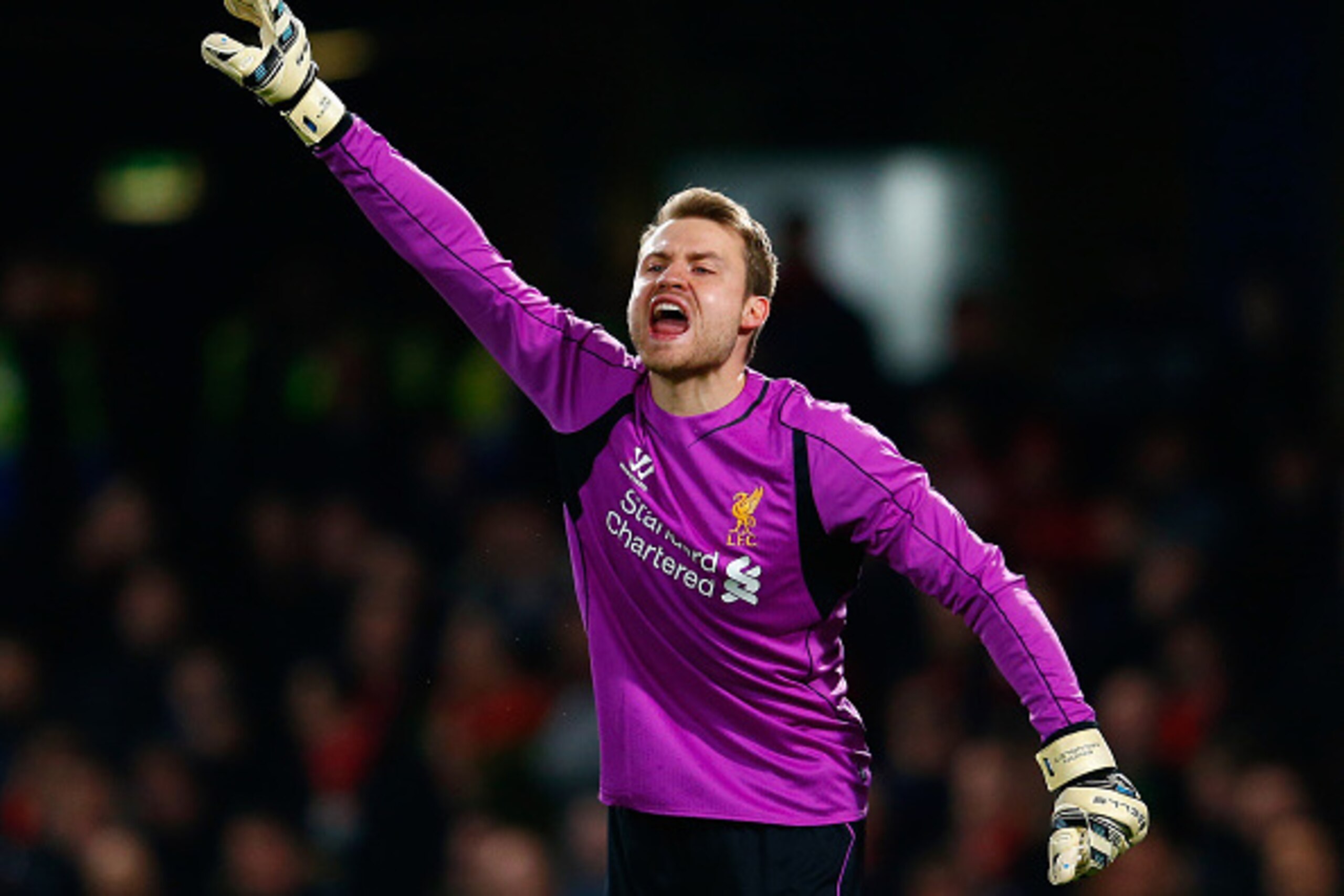 LONDON, ENGLAND - JANUARY 27:  Simon Mignolet of Liverpool shouts instructions during the Capital One Cup Semi-Final second leg between Chelsea and Liverpool at Stamford Bridge on January 27, 2015 in London, England.  (Photo by Julian Finney/Getty Images)