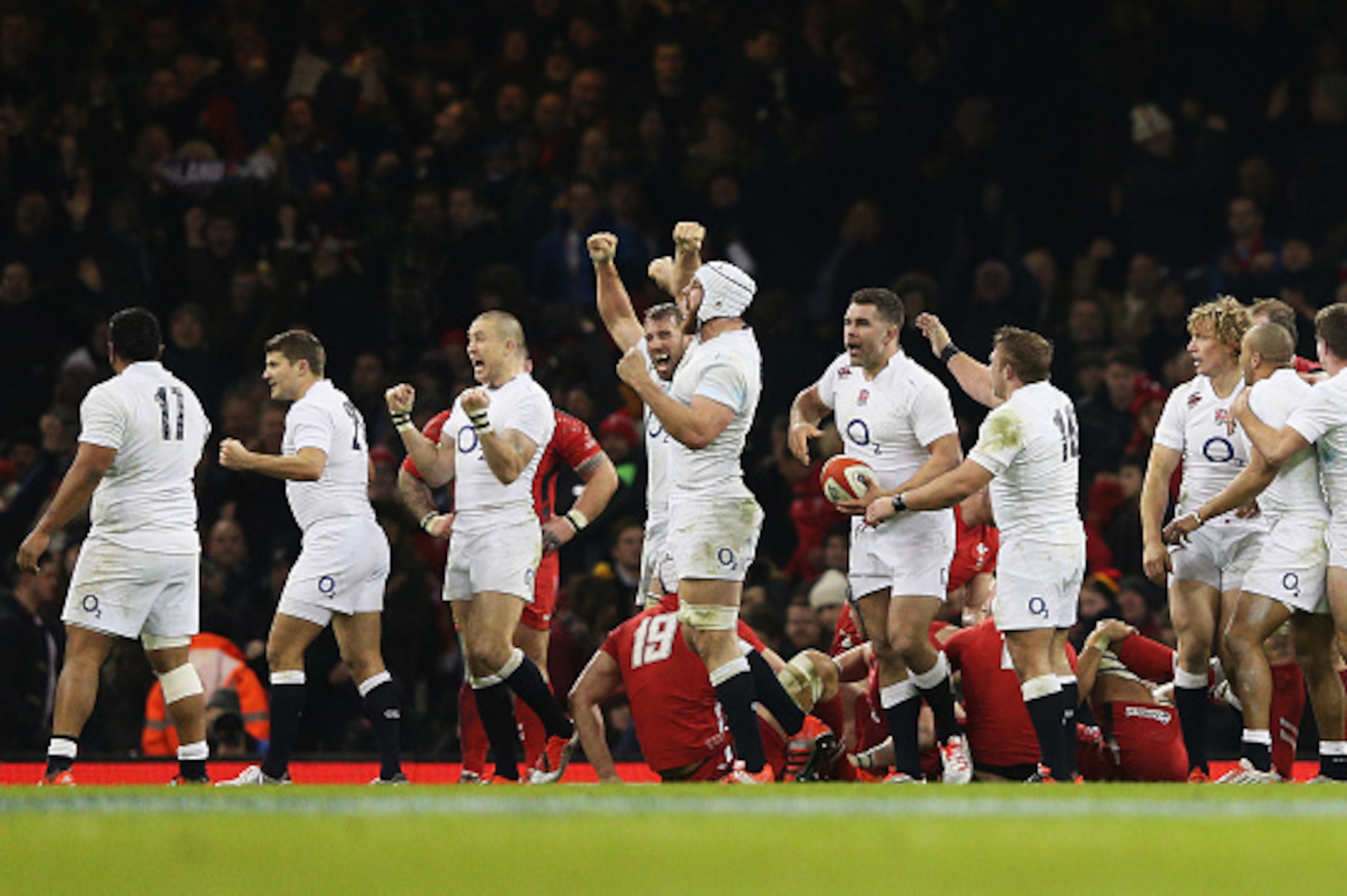 CARDIFF, WALES - FEBRUARY 06:  England players celebrate victory at the final whistle during the RBS Six Nations match between Wales and England at the Millennium Stadium on February 6, 2015 in Cardiff, Wales.  (Photo by Clive Mason/Getty Images)