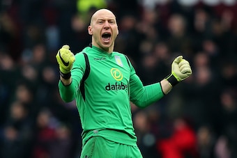 BIRMINGHAM, ENGLAND - FEBRUARY 07:  Brad Guzan of Aston Villa celebrates after team-mate Jores Okore scored their first goal during the Barclays Premier League match between Aston Villa and Chelsea at Villa Park on February 7, 2015 in Birmingham, England.