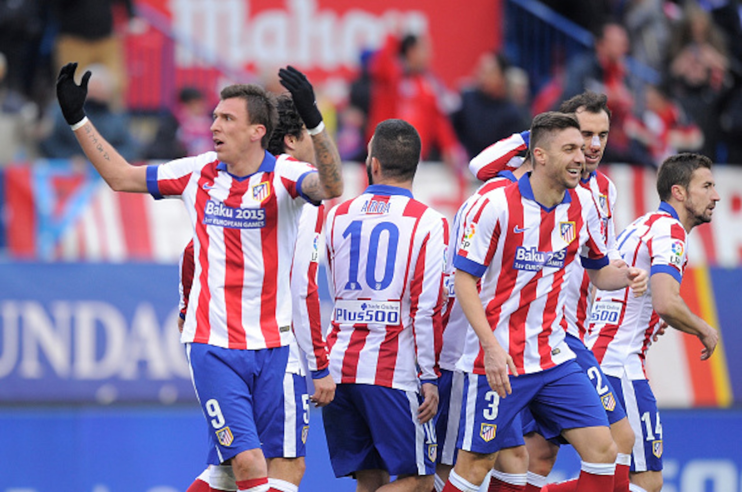 MADRID, SPAIN - FEBRUARY 07:  Mario Mandzukic of Club Atletico de Madrid celebrates after scoring his team's 4th goal during the La Liga match between Club Atletico de Madrid and Real Madrid at Vicente Calderon Stadium on February 7, 2015 in Madrid, Spain