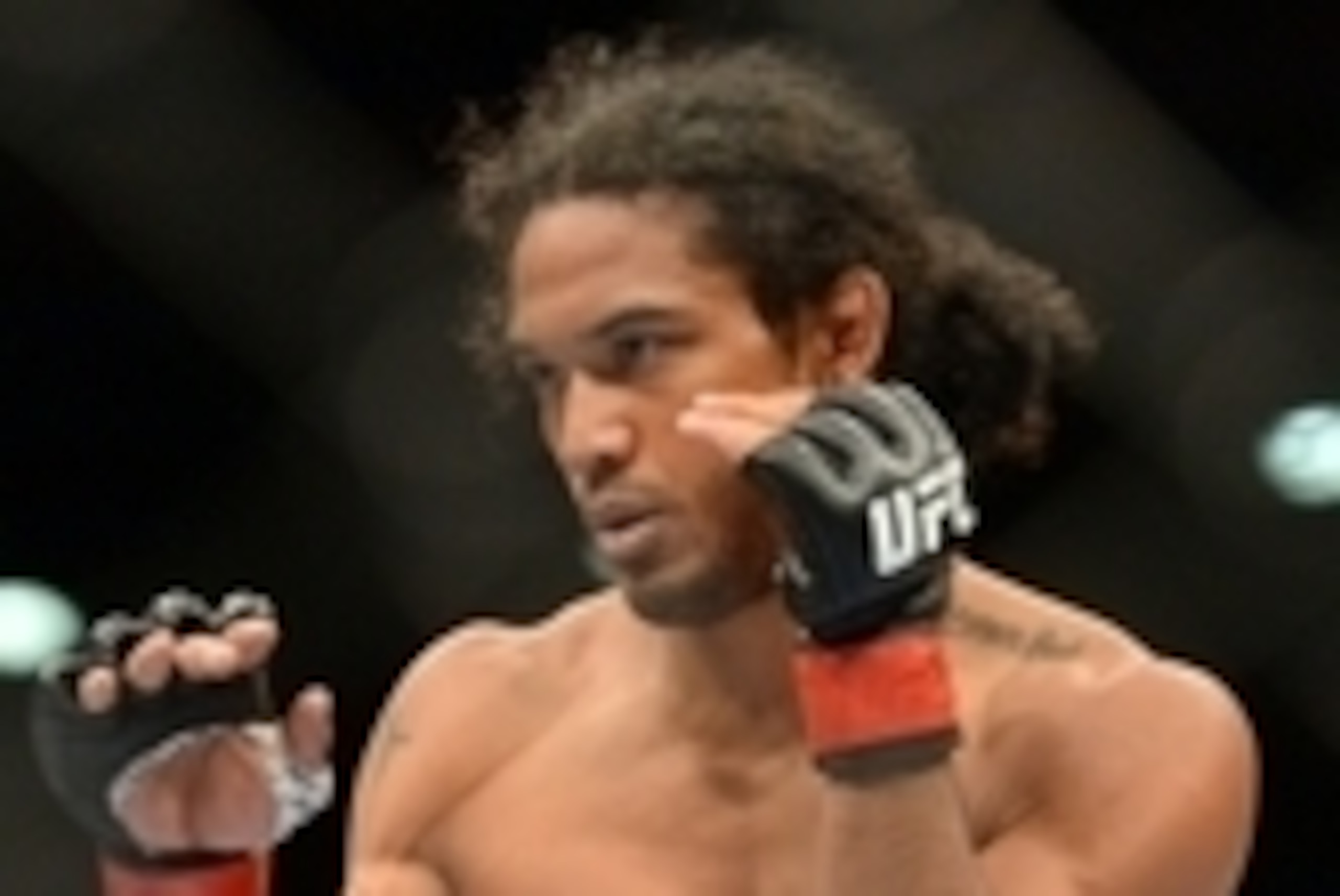 Jun 7, 2014; Albuquerque, NM, USA; Benson Henderson (red) and Rustam Khabilov (blue) fight during their lightweight bout during UFC Fight Night 42 at Tingley Coliseum. Henderson won via fourth round submission. Mandatory Credit: Joe Camporeale-USA TODAY S
