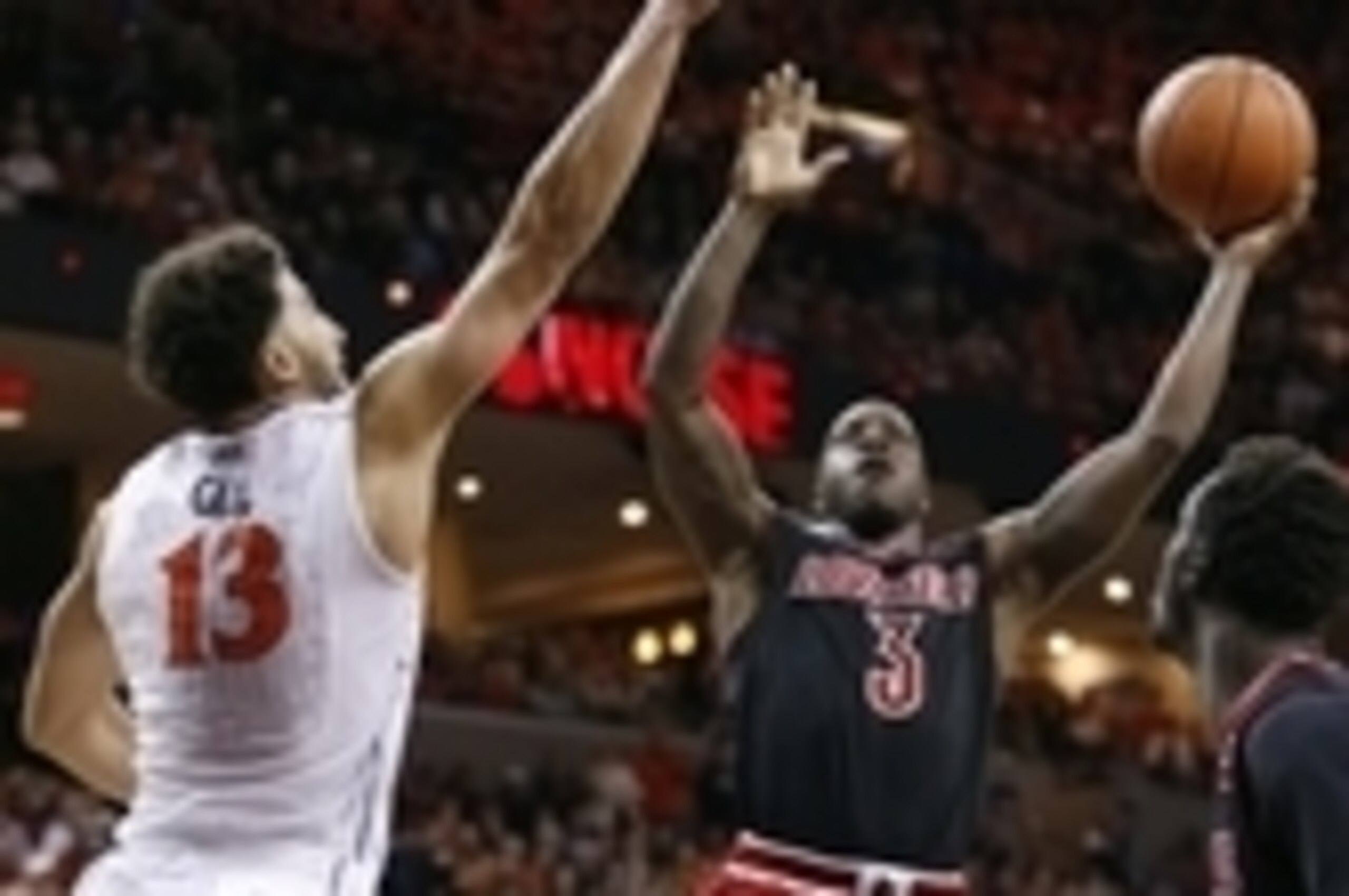 Feb 7, 2015; Charlottesville, VA, USA; Louisville Cardinals guard Chris Jones (3) shoots the ball over Virginia Cavaliers forward Anthony Gill (13) in the second half at John Paul Jones Arena. The Cavaliers won 52-47. Mandatory Credit: Geoff Burke-USA TOD Feb 7, 2015; Charlottesville, VA, USA; Louisville Cardinals guard Chris Jones (3) shoots the ball over Virginia Cavaliers forward Anthony Gill (13) in the second half at John Paul Jones Arena. The Cavaliers won 52-47. Mandatory Credit: Geoff Burke-USA TOD