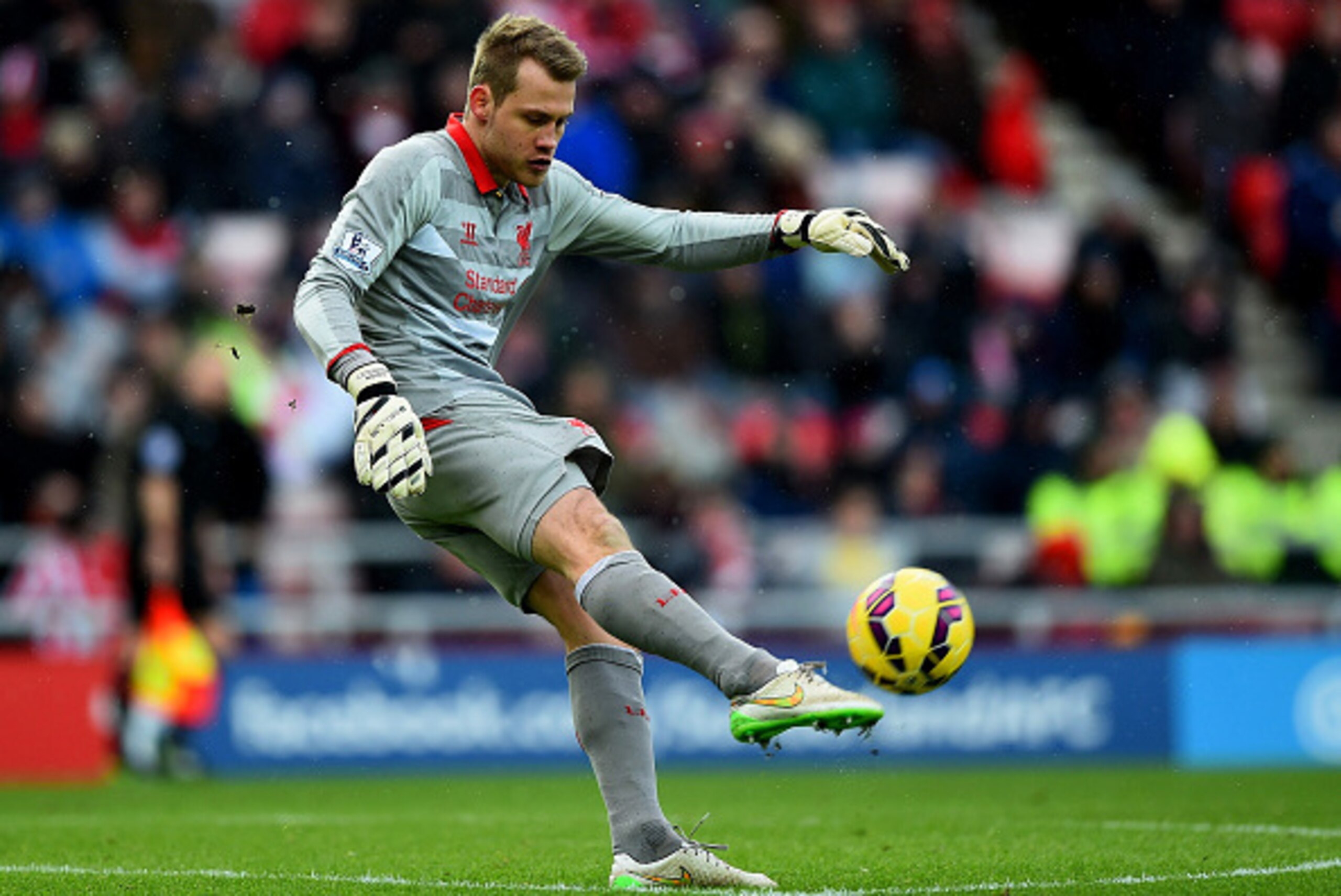 SUNDERLAND, ENGLAND - JANUARY 10:  Simon Mignolet of Liverpool kicks the ball during the Barclays Premier League match between Sunderland and Liverpool at Stadium of Light on January 10, 2015 in Sunderland, England.  (Photo by Laurence Griffiths/Getty Ima