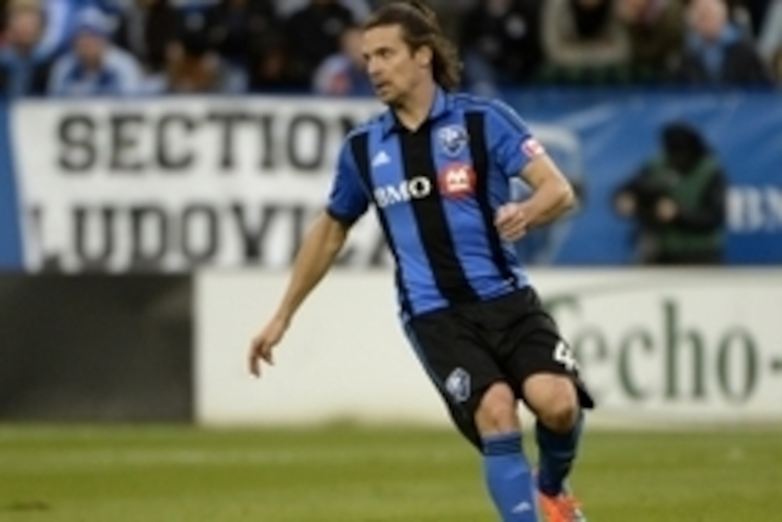 Oct 11, 2014; Montreal, Quebec, CAN; Montreal Impact defender Heath Pearce (44) dribbles the ball during the second half against the New England Revolution at Stade Saputo. Mandatory Credit: Eric Bolte-USA TODAY Sports Oct 11, 2014; Montreal, Quebec, CAN; Montreal Impact defender Heath Pearce (44) dribbles the ball during the second half against the New England Revolution at Stade Saputo. Mandatory Credit: Eric Bolte-USA TODAY Sports