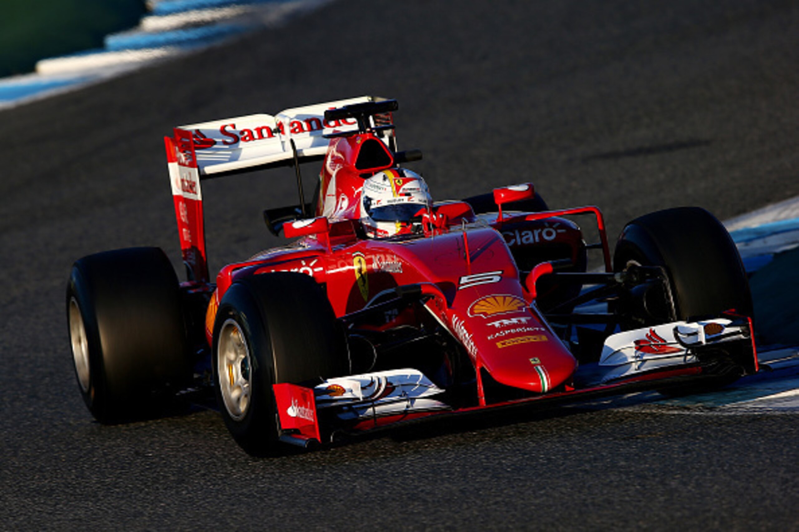 JEREZ DE LA FRONTERA, SPAIN - FEBRUARY 02:  Sebastian Vettel of Germany and Ferrari drives during day two of Formula One Winter Testing at Circuito de Jerez on February 2, 2015 in Jerez de la Frontera, Spain.  (Photo by Mark Thompson/Getty Images)