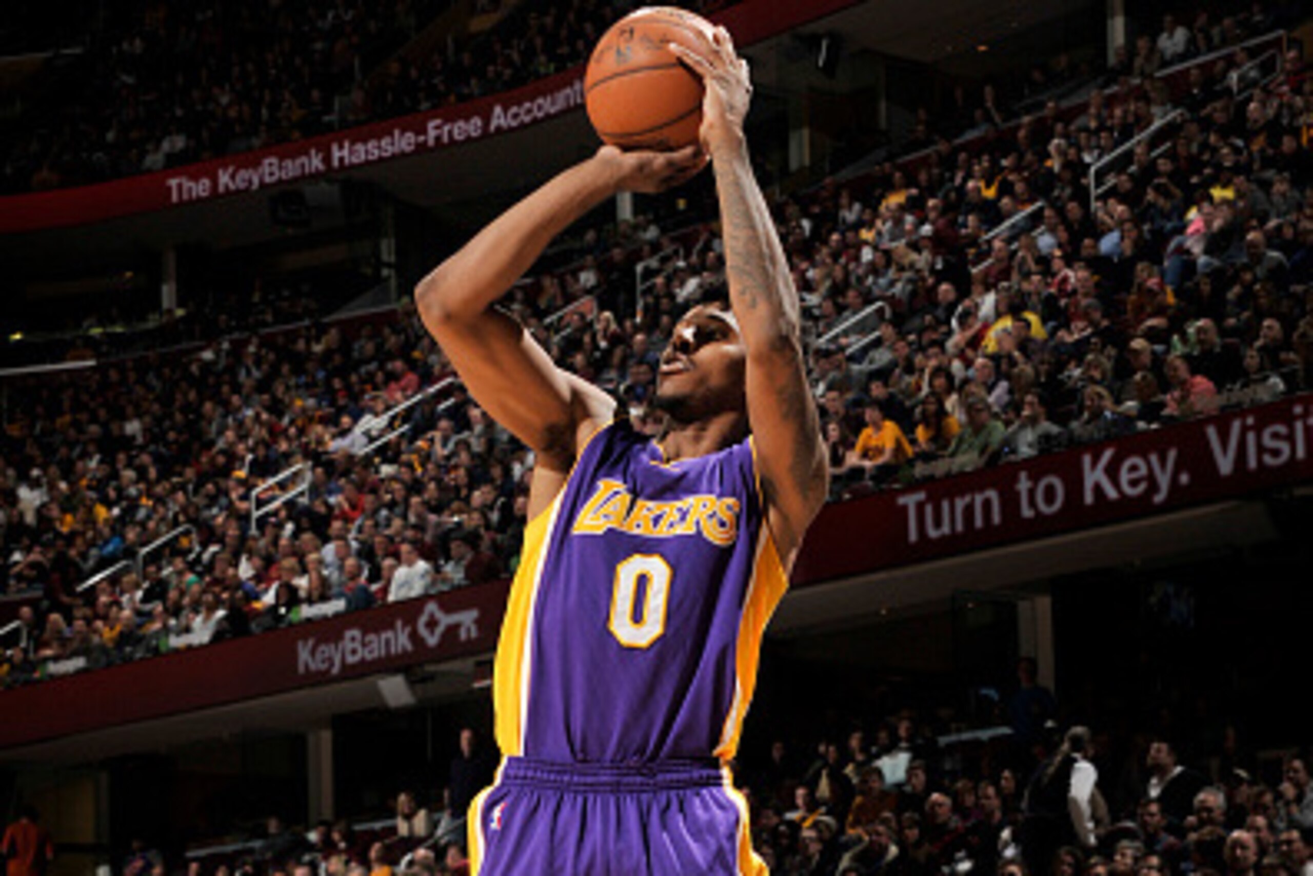 CLEVELAND, OH -  FEBRUARY 8: Nick Young #0 of the Los Angeles Lakers shoots against the Cleveland Cavaliers during the game on February 8, 2015 at Quicken Loans Arena in Cleveland, Ohio. NOTE TO USER: User expressly acknowledges and agrees that, by downlo
