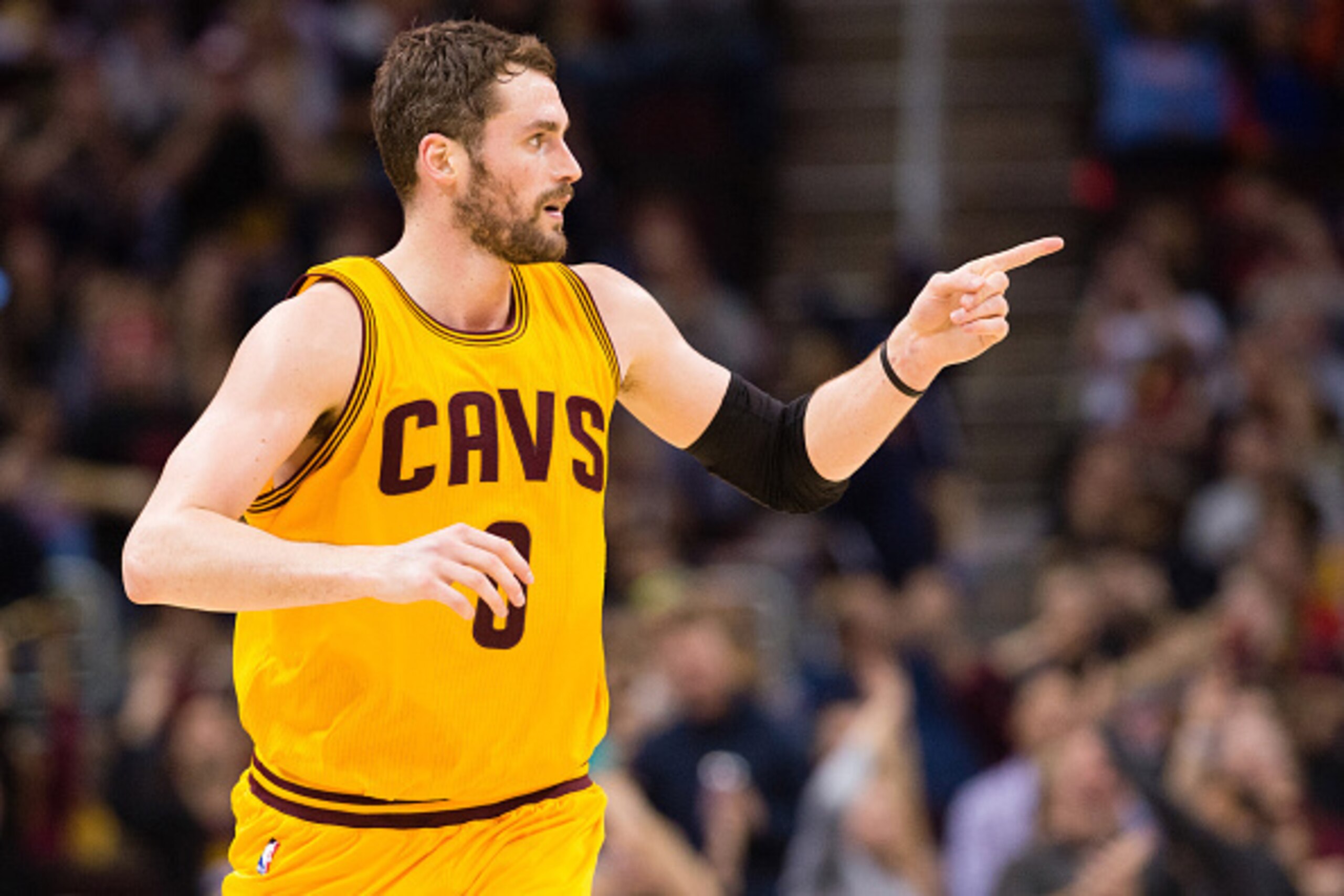 CLEVELAND, OH - FEBRUARY 8: Kevin Love #0 of the Cleveland Cavaliers celebrates after scoring during the first half against the Los Angeles Lakers at Quicken Loans Arena on February 8, 2015 in Cleveland, Ohio. NOTE TO USER: User expressly acknowledges and