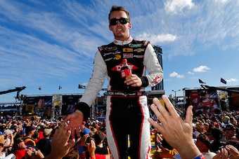 HOMESTEAD, FL - NOVEMBER 16:  Austin Dillon, driver of the #3 Dow Chevrolet, is introduced during pre-race ceremonies for the NASCAR Sprint Cup Series Ford EcoBoost 400 at Homestead-Miami Speedway on November 16, 2014 in Homestead, Florida.  (Photo by Jon