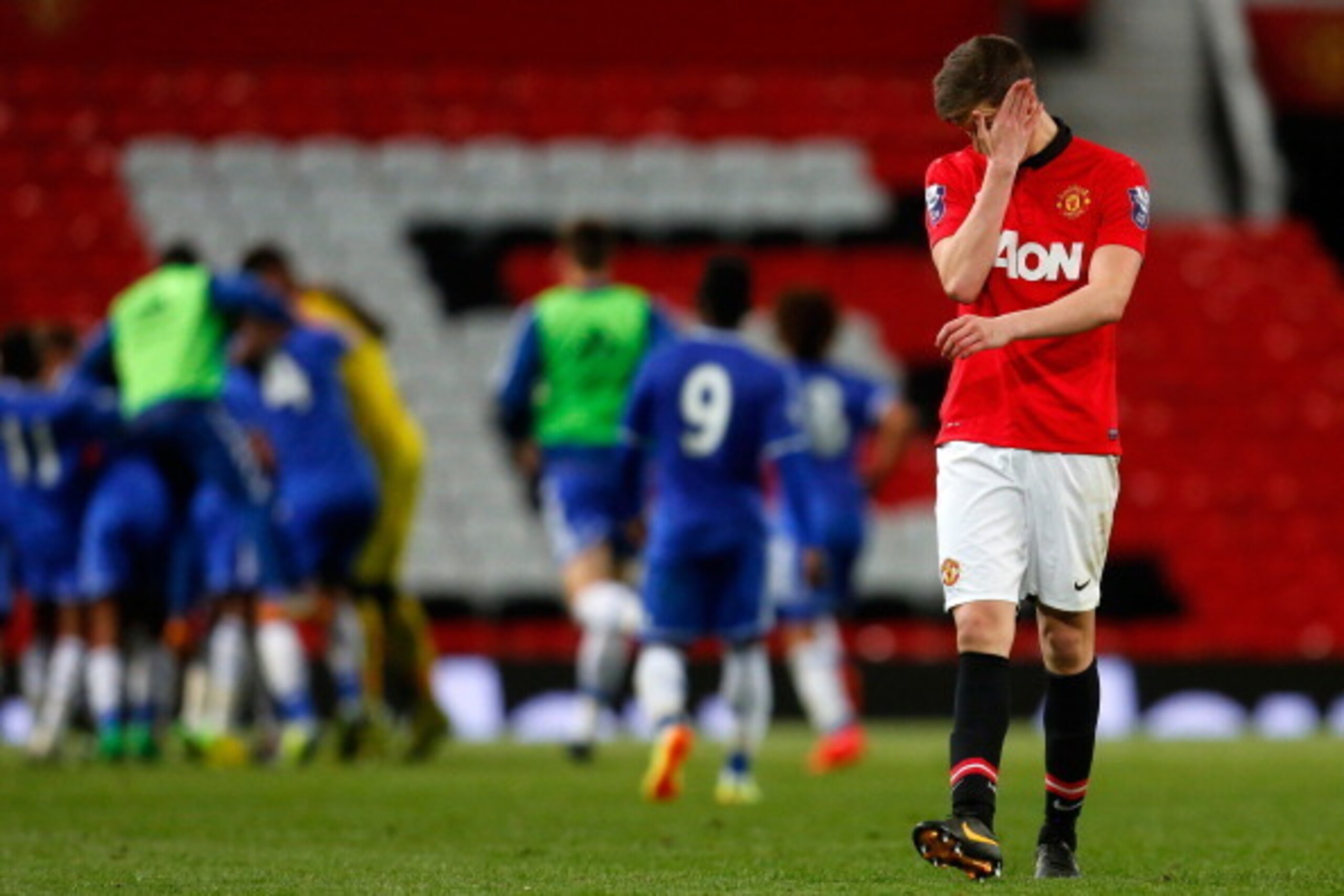 MANCHESTER, ENGLAND - MAY 14: Patrick McNair of Manchester United reacts at the final whistle during the Barclays Under-21 Premier League Final match between Manchester United and Chelsea at Old Trafford on May 14, 2014 in Manchester, England. (Photo by P