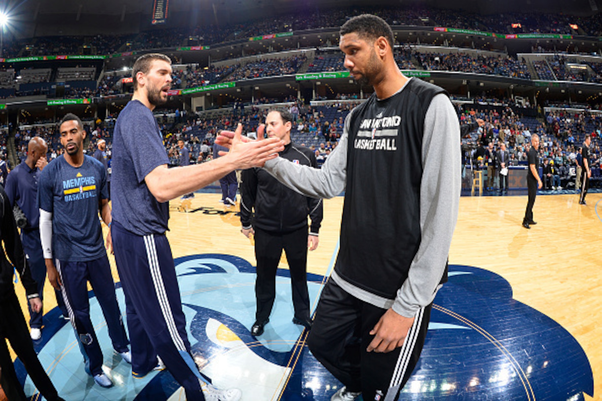 MEMPHIS, TN - DECEMBER 30:  Marc Gasol #33 of the Memphis Grizzlies and Tim Duncan #21 of the San Antonio Spurs before the game on December 30, 2014 at FedExForum in Memphis, Tennessee. NOTE TO USER: User expressly acknowledges and agrees that, by downloa