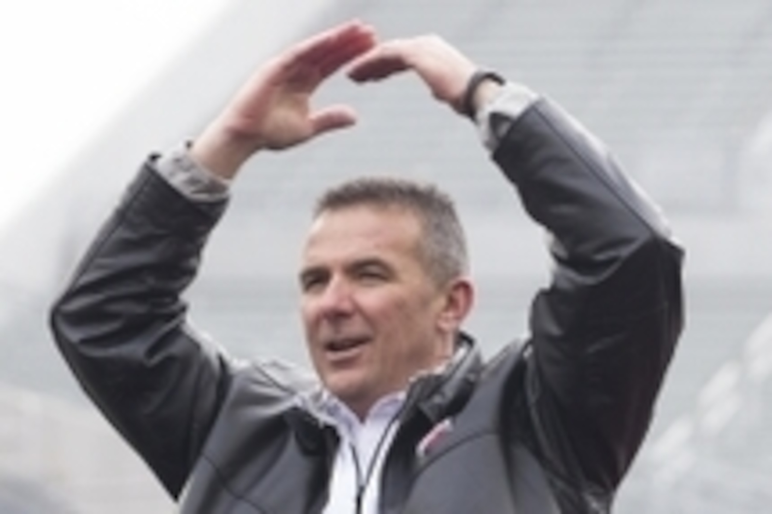 Jan 24, 2015; Columbus, OH, USA; Ohio State Buckeyes head coach Urban Meyer shows the letter O during the National Championship celebration at Ohio Stadium. Mandatory Credit: Greg Bartram-USA TODAY Sports