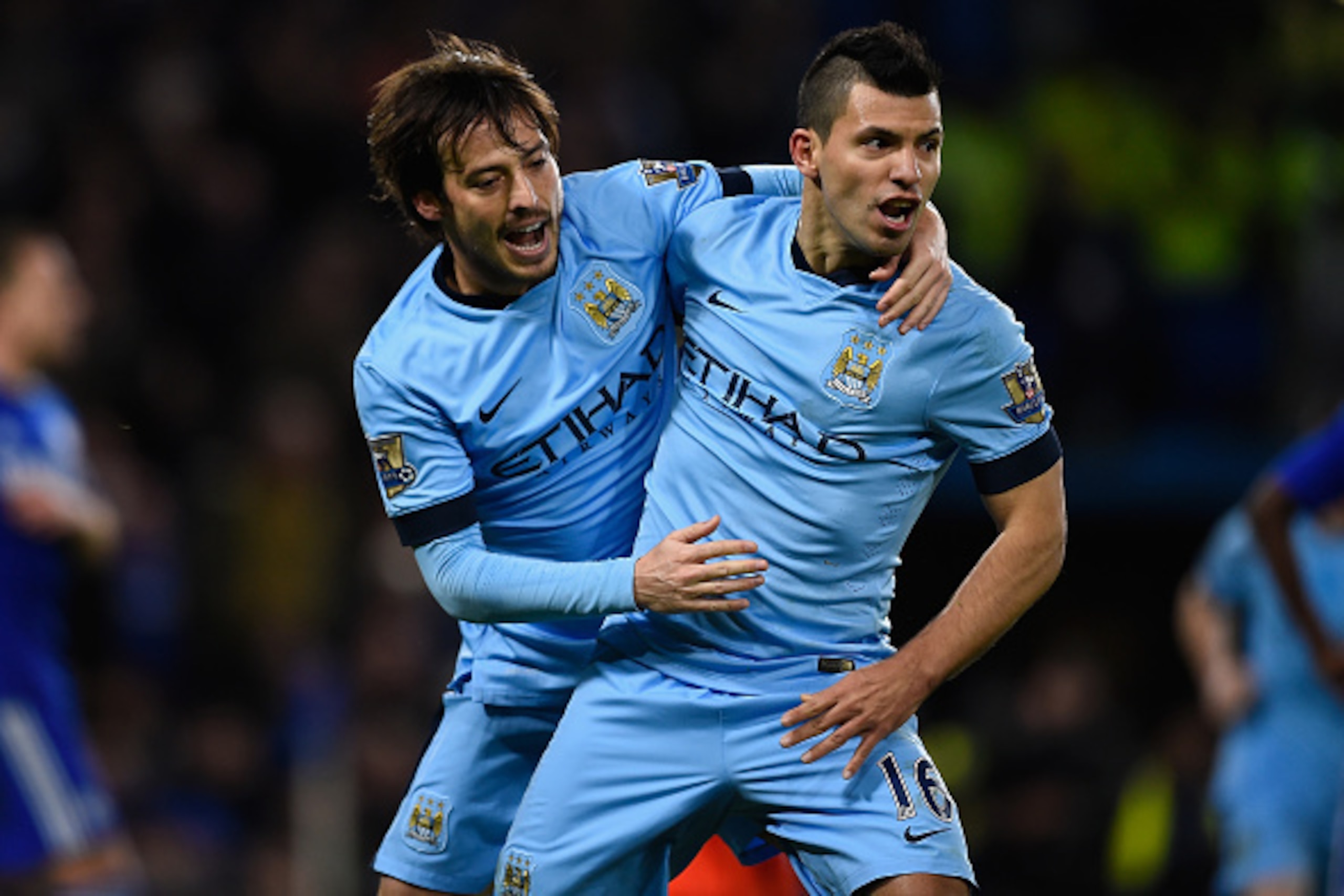 LONDON, ENGLAND - JANUARY 31:  Goalscorer David Silva of Manchester City (L) celebrates with teammate Sergio Aguero after scoring the equalising goal during the Barclays Premier League match between Chelsea and Manchester City at Stamford Bridge on Januar