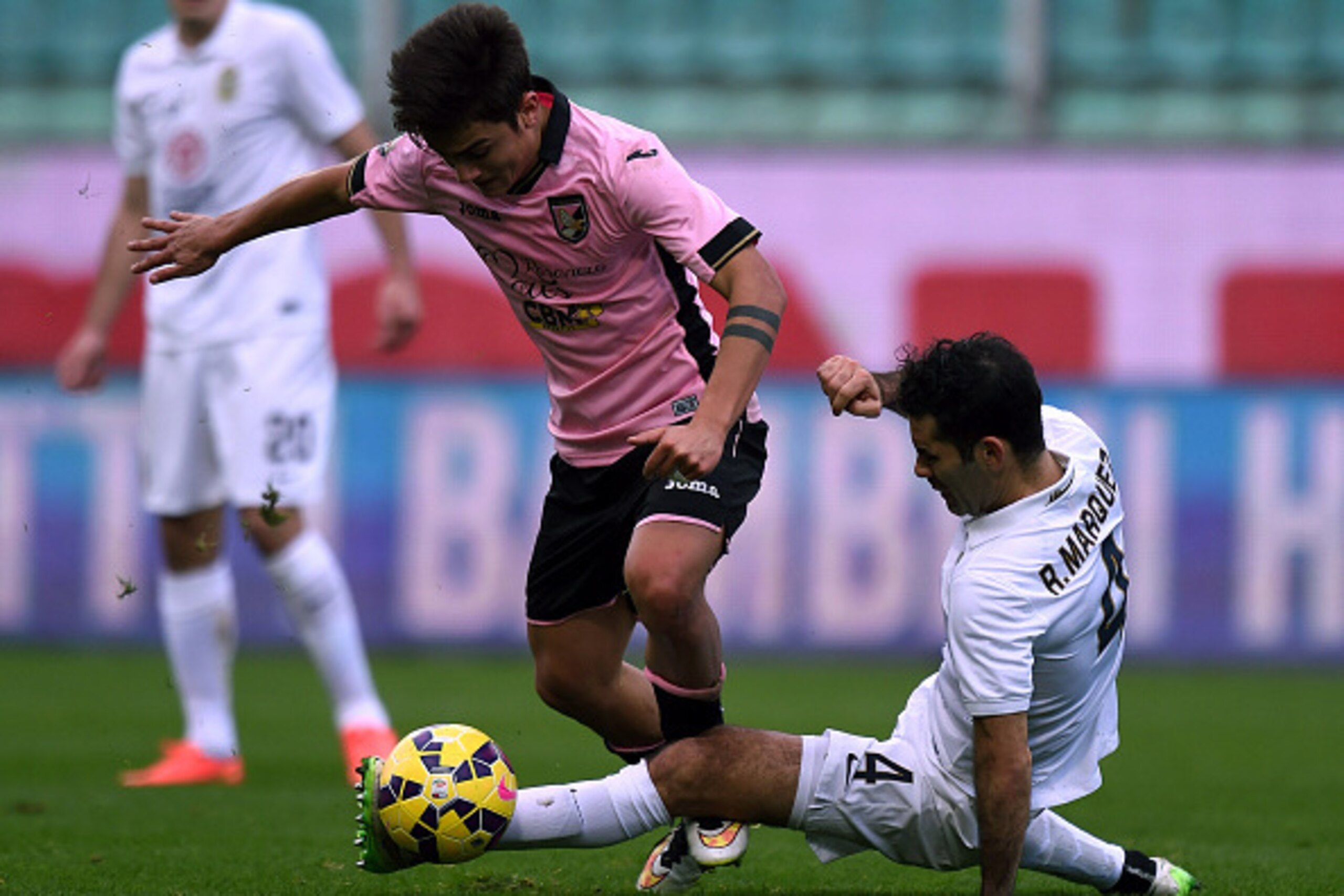 PALERMO, ITALY - FEBRUARY 01:  Paulo Dybala (L) of Palermo and Rafael Marquez of Hellas Verona compete for the ball during the Serie A match between US Citta di Palermo and Hellas Verona FC at Stadio Renzo Barbera on February 1, 2015 in Palermo, Italy.  (