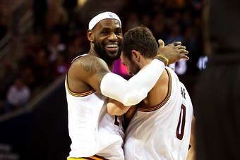 CLEVELAND, OH - DECEMBER 23:  LeBron James #23 and Kevin Love #0 of the Cleveland Cavaliers react after a play in the second half against the Minnesota Timberwolves at Quicken Loans Arena on December 23, 2014 in Cleveland, Ohio. NOTE TO USER: User express
