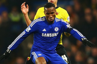 LONDON, ENGLAND - JANUARY 04:  Didier Drogba of Chelsea holds off Gabriele Angella of Watford during the FA Cup Third Round match between Chelsea and Watford at Stamford Bridge on January 4, 2015 in London, England.  (Photo by Richard Heathcote/Getty Imag