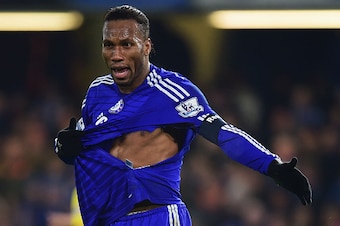 LONDON, ENGLAND - JANUARY 04:  Didier Drogba of Chelsea appeals as he shows his ripped shirt during the FA Cup Third Round match between Chelsea and Watford at Stamford Bridge on January 4, 2015 in London, England.  (Photo by Jamie McDonald/Getty Images)