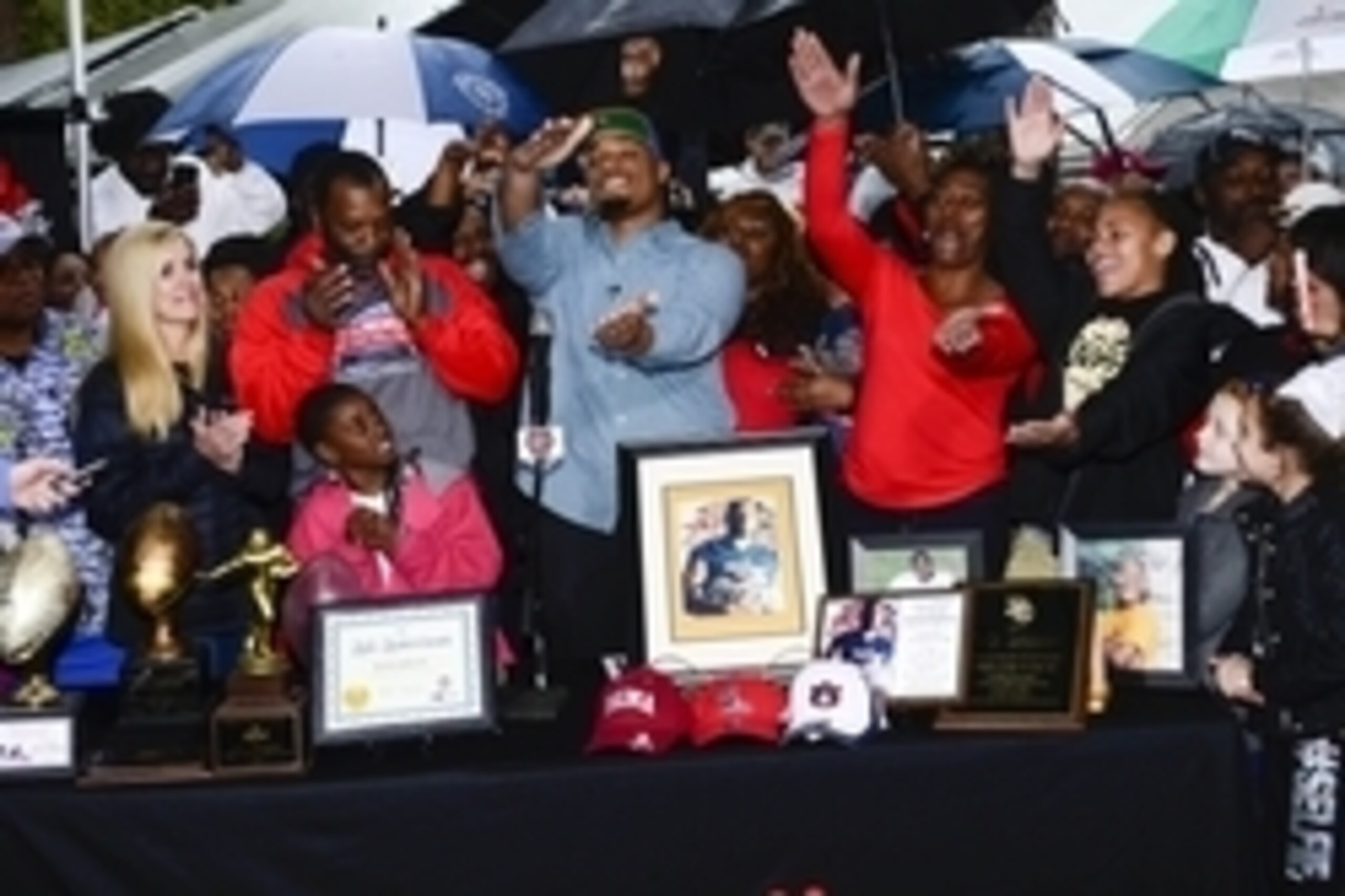 Feb 4, 2015; Glen Saint Mary, FL, USA; Ce Ce Jefferson signs with the University of Florida at his home near  Baker County High School  as his parents Leo and Annette Jefferson look on. Mandatory Credit: Richard Dole-USA TODAY Sports
