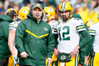 SEATTLE, WA - JANUARY 18:  Aaron Rodgers #12 speaks with head coach Mike McCarthy of the Green Bay Packers against the Seattle Seahawks during the 2015 NFC Championship game at CenturyLink Field on January 18, 2015 in Seattle, Washington.  (Photo by Kevin