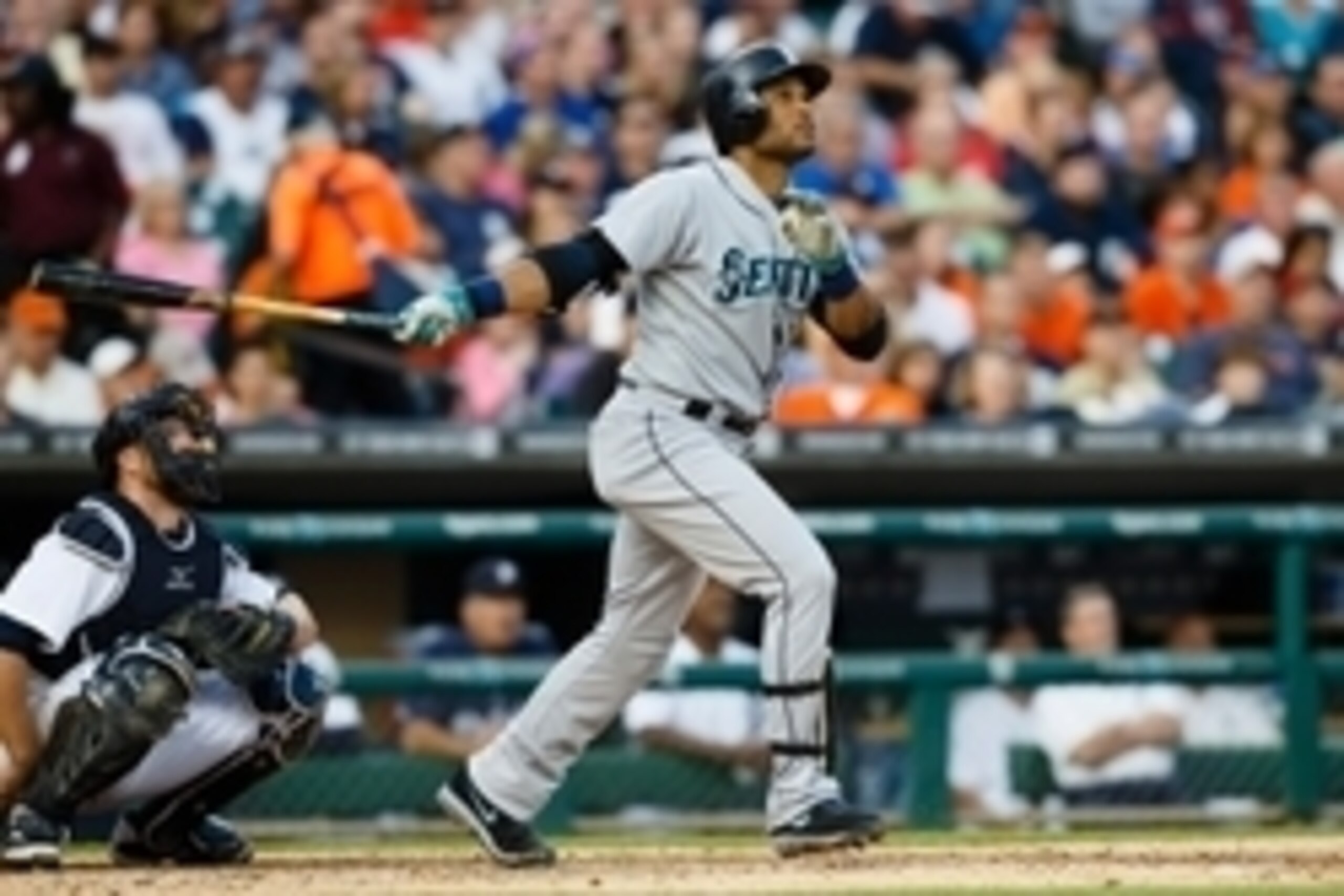 Aug 15, 2014; Detroit, MI, USA; Seattle Mariners second baseman Robinson Cano (22) hits a home run in the third inning against the Detroit Tigers at Comerica Park. Mandatory Credit: Rick Osentoski-USA TODAY Sports Aug 15, 2014; Detroit, MI, USA; Seattle Mariners second baseman Robinson Cano (22) hits a home run in the third inning against the Detroit Tigers at Comerica Park. Mandatory Credit: Rick Osentoski-USA TODAY Sports