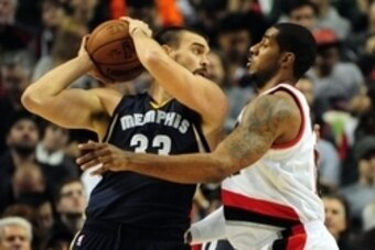 Nov 28, 2014; Portland, OR, USA; Memphis Grizzlies center Marc Gasol (33) tries to get past Portland Trail Blazers forward LaMarcus Aldridge (12) during the first quarter of the game at the Moda Center at the Rose Quarter. Mandatory Credit: Steve Dykes-US