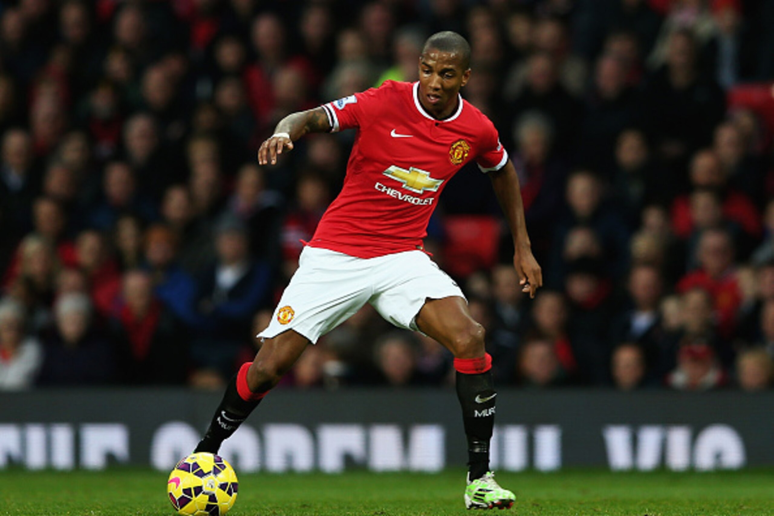 MANCHESTER, ENGLAND - NOVEMBER 29:  Ashley Young of Manchester United in action during the Barclays Premier League match between Manchester United and Hull City at Old Trafford on November 29, 2014 in Manchester, England.  (Photo by Matthew Lewis/Getty Im