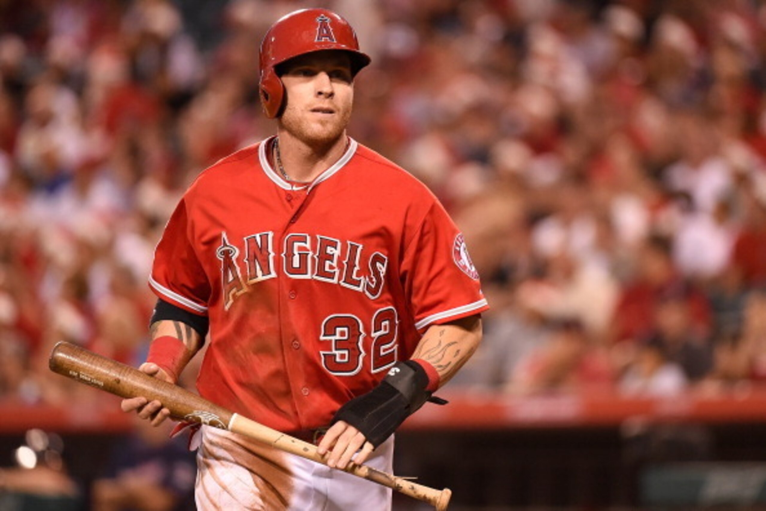 ANAHEIM, CA - JUNE 25:  Josh Hamilton #32 of the Los Angeles Angels of Anaheim scores in the third inning against the Minnesota Twins at Angel Stadium of Anaheim on June 25, 2014 in Anaheim, California.  (Photo by Lisa Blumenfeld/Getty Images)