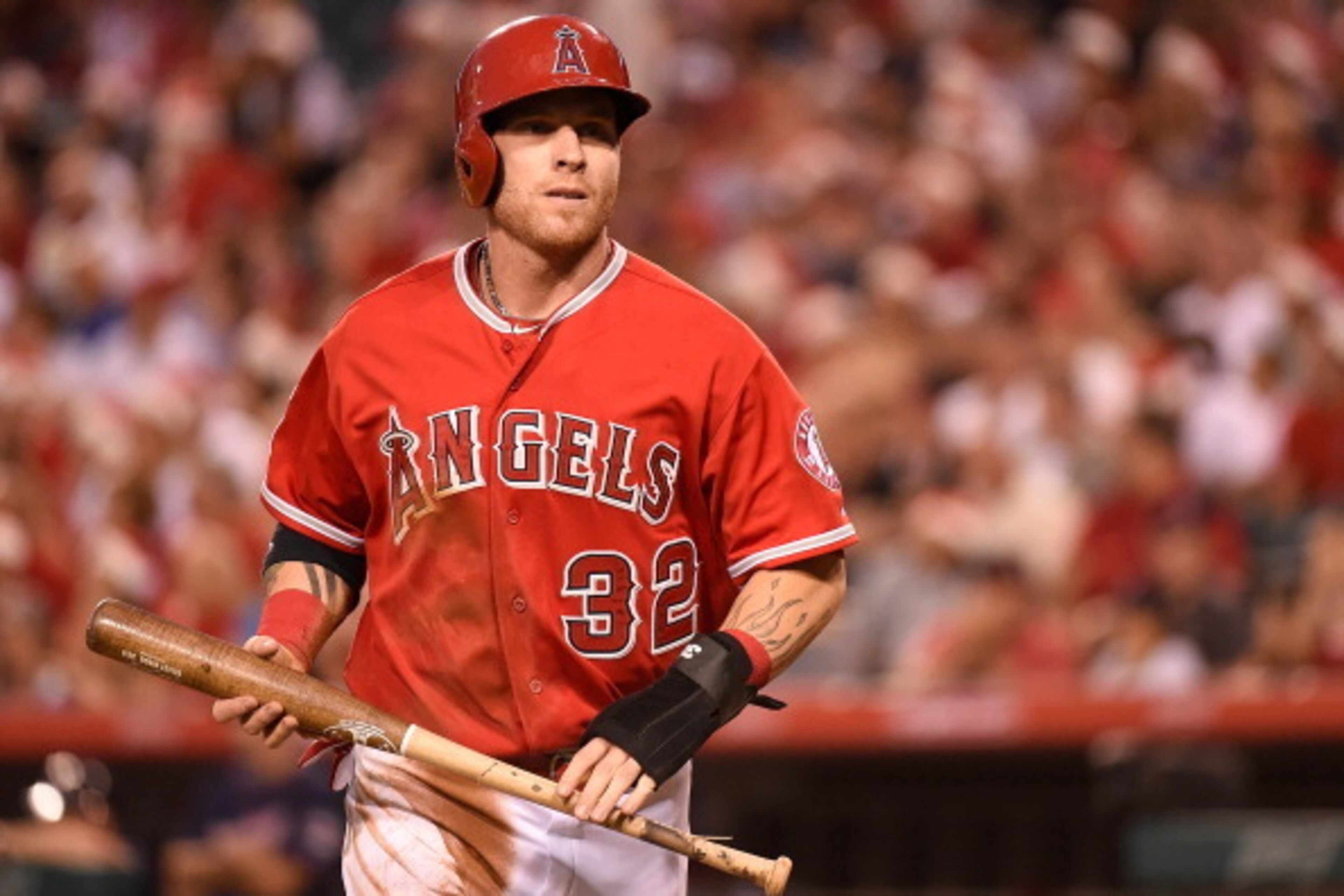 ANAHEIM, CA - JUNE 25:  Josh Hamilton #32 of the Los Angeles Angels of Anaheim scores in the third inning against the Minnesota Twins at Angel Stadium of Anaheim on June 25, 2014 in Anaheim, California.  (Photo by Lisa Blumenfeld/Getty Images)